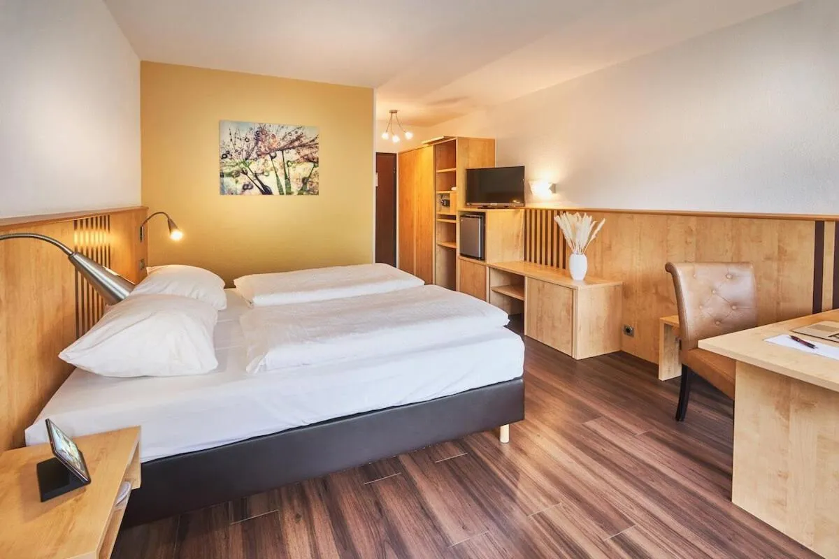 Photo of the whole room, Bed in Parkhotel Nümbrecht