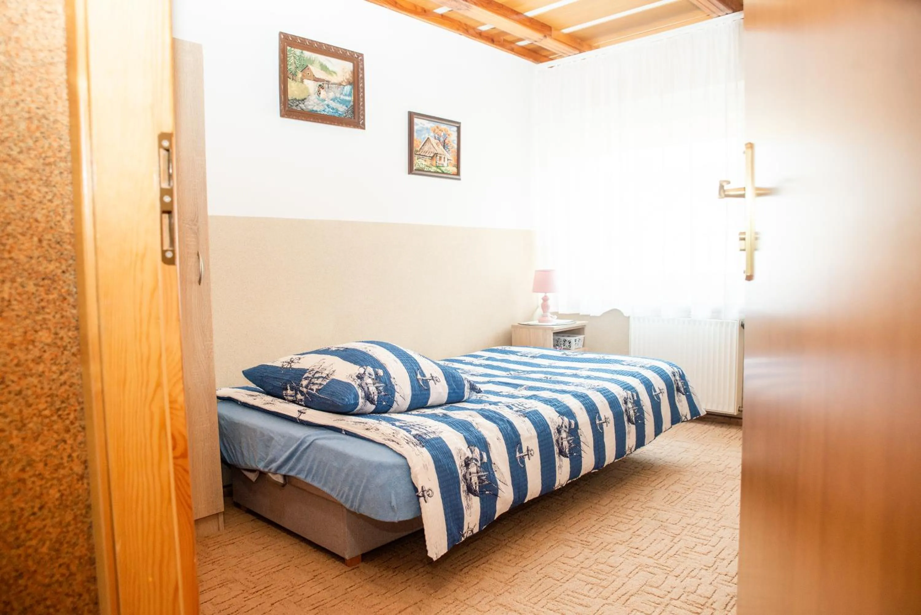 Bed in Pokoje Goscinne u Jedrusia