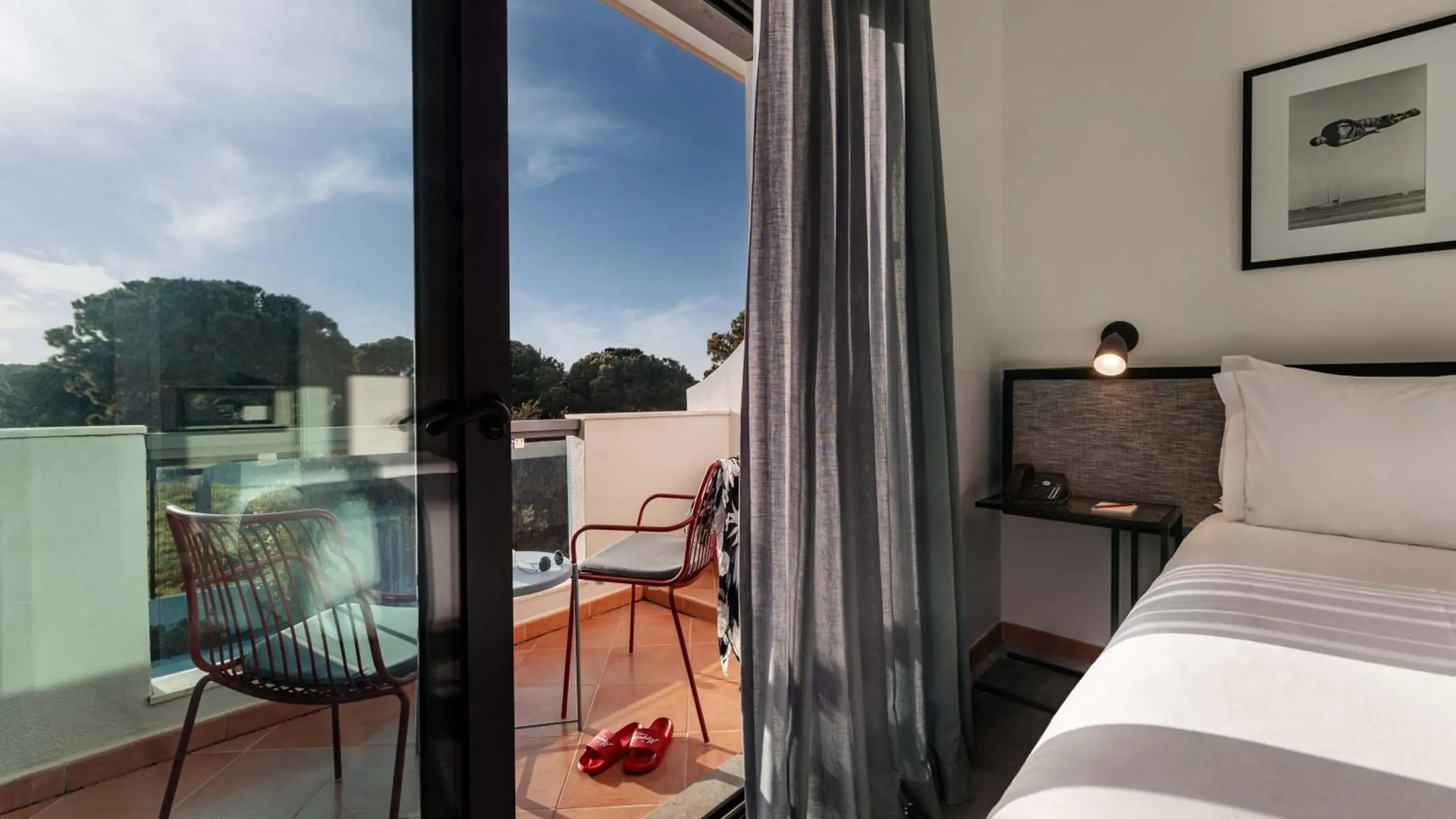 Balcony/Terrace, Bed in The Magnolia Hotel Balcony/Terrace, Bed in The Magnolia Hotel