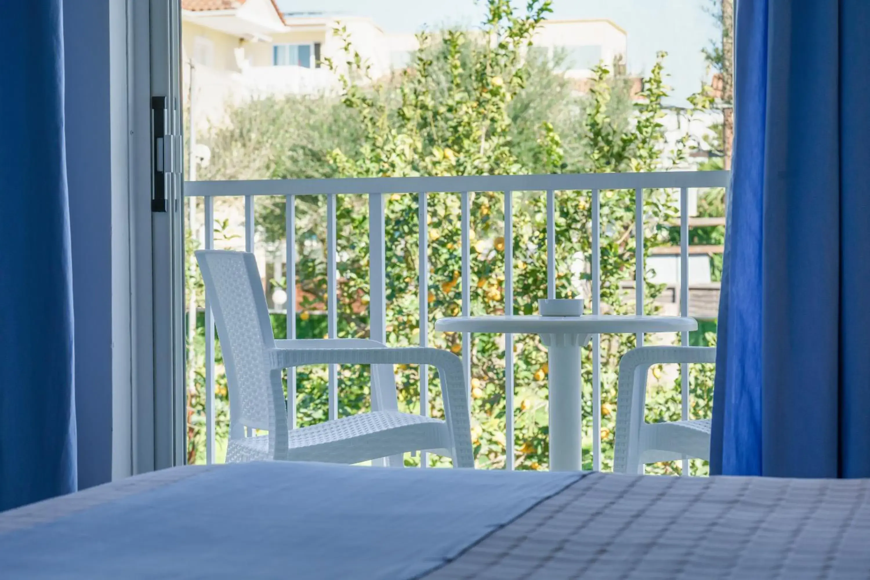 Bathroom, Bed in Filoxenia Hotel Zakynthos Bathroom, Bed in Filoxenia Hotel Zakynthos