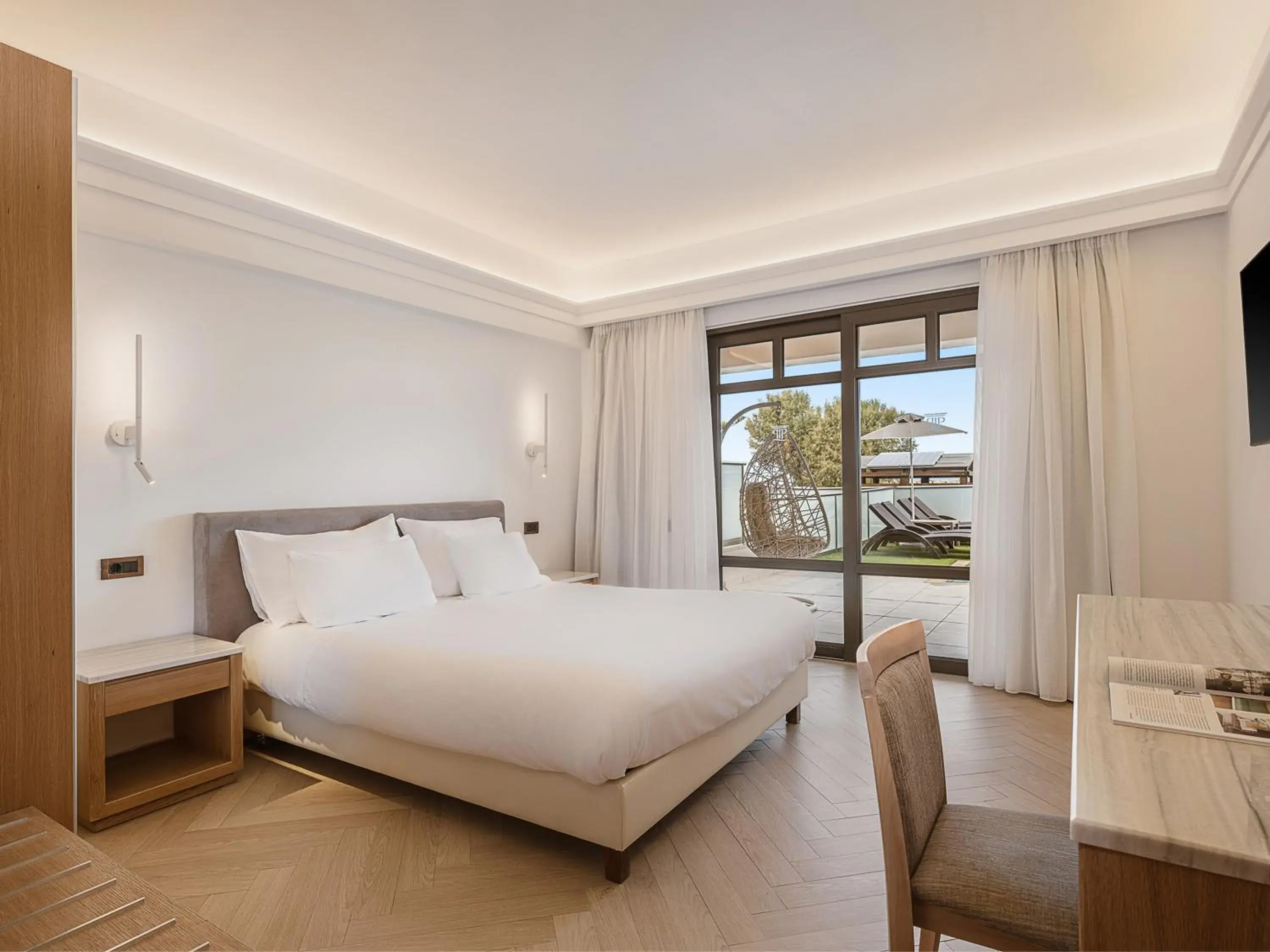 Bed in Porto Platanias Beach Resort & Spa Bed in Porto Platanias Beach Resort & Spa
