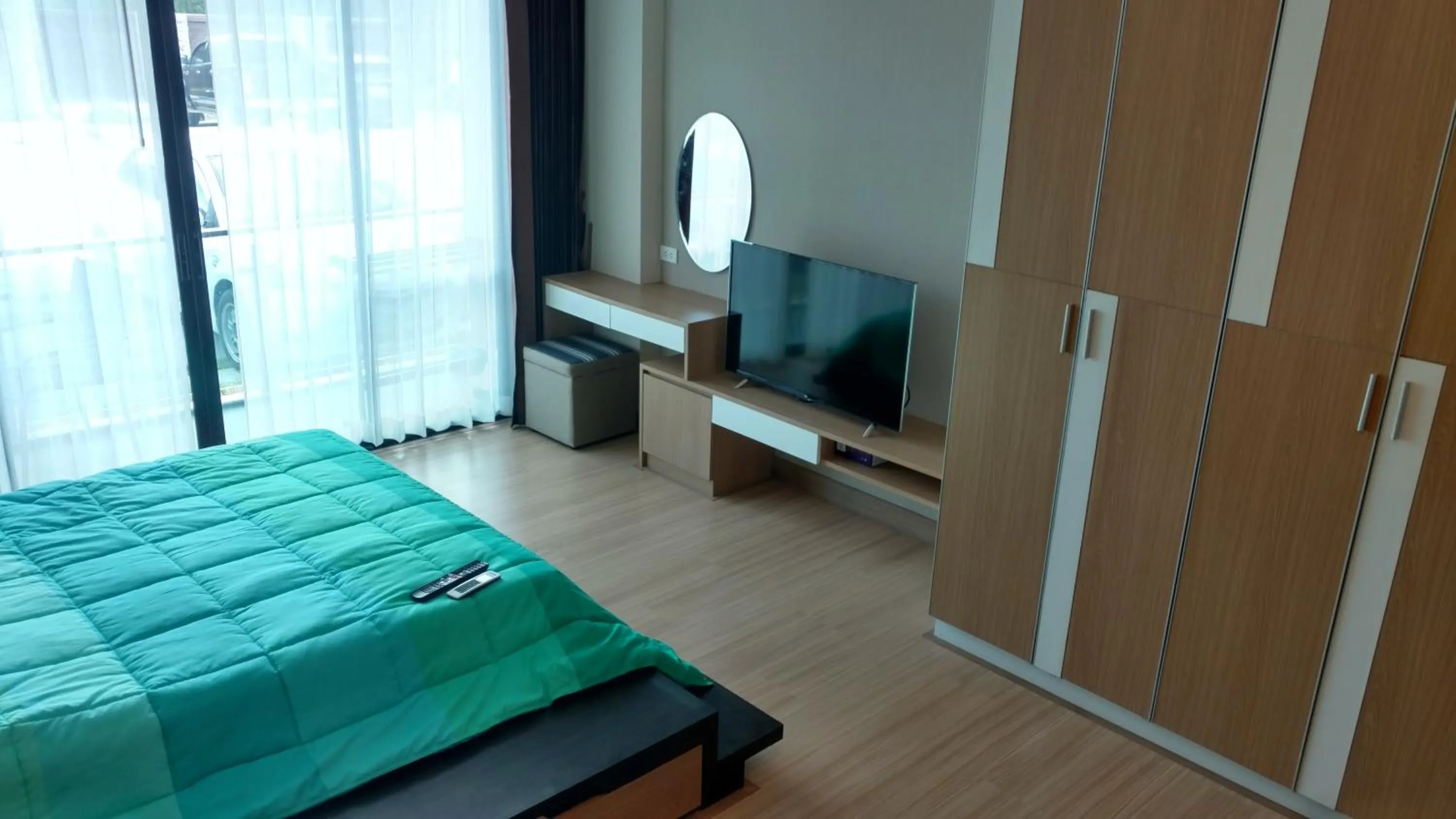 Photo of the whole room, Bed in Naithon condominium A-103