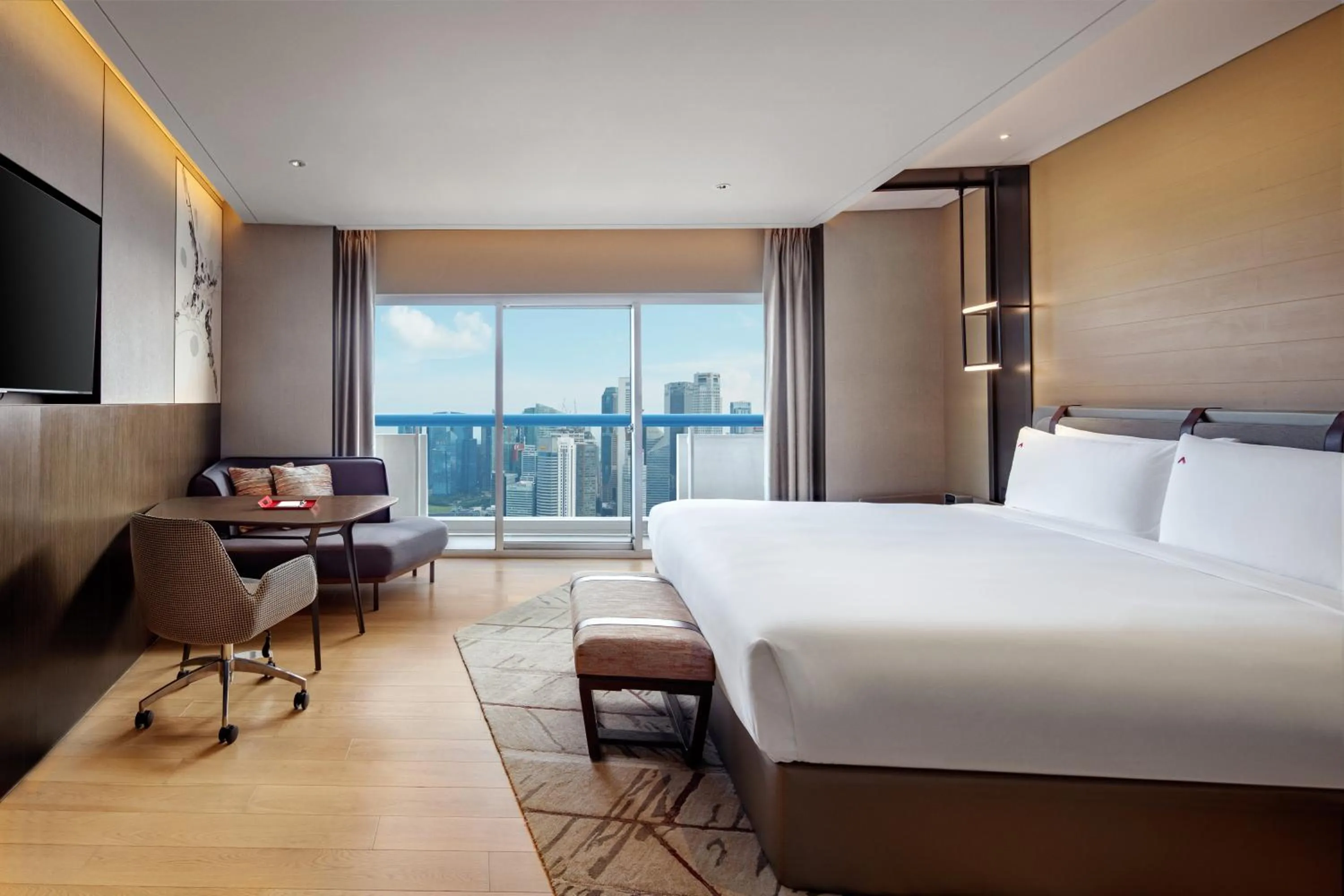 Property building, Bed in Swissotel The Stamford Singapore