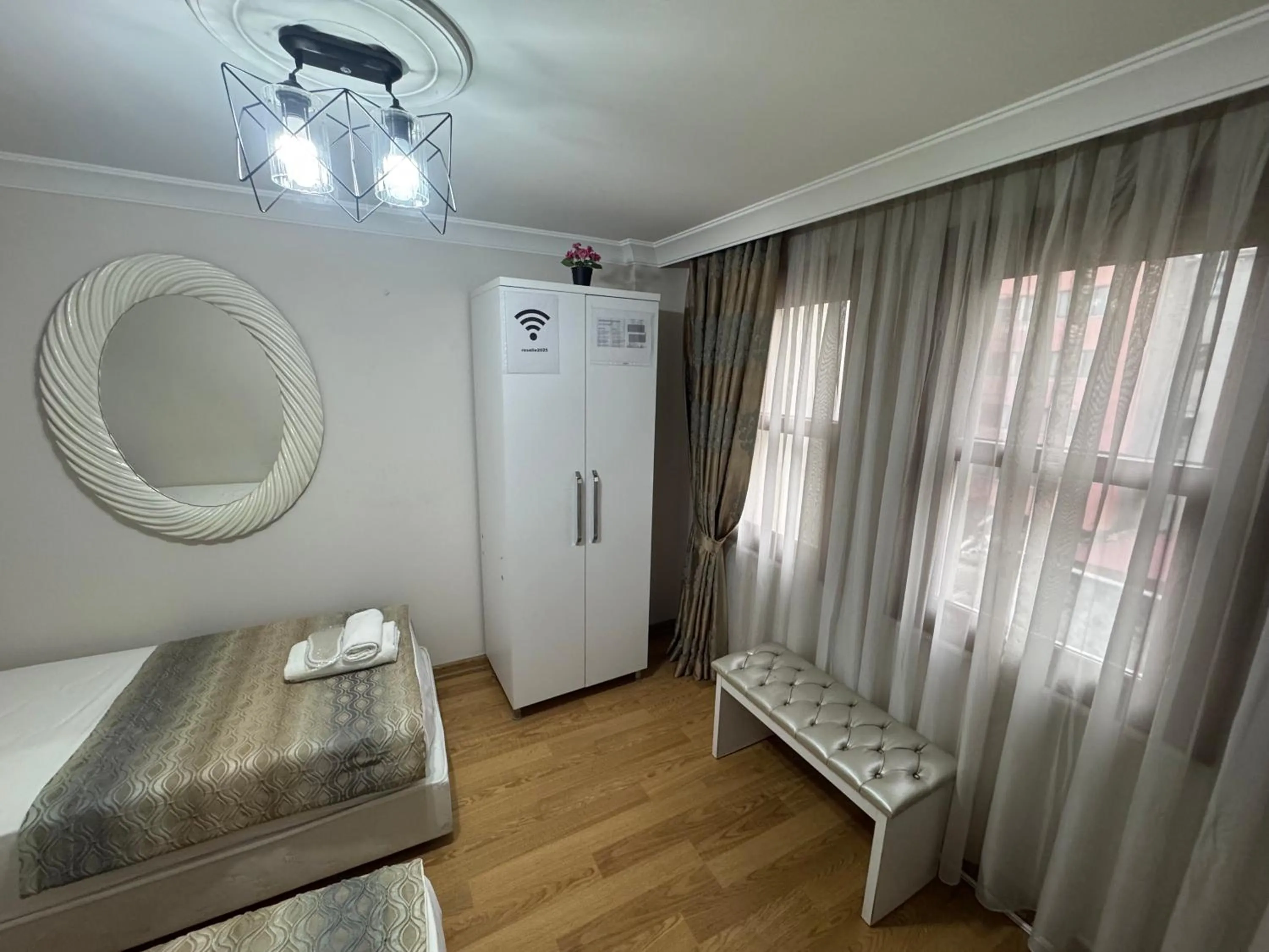 wardrobe in Rosalie Palace Hotel