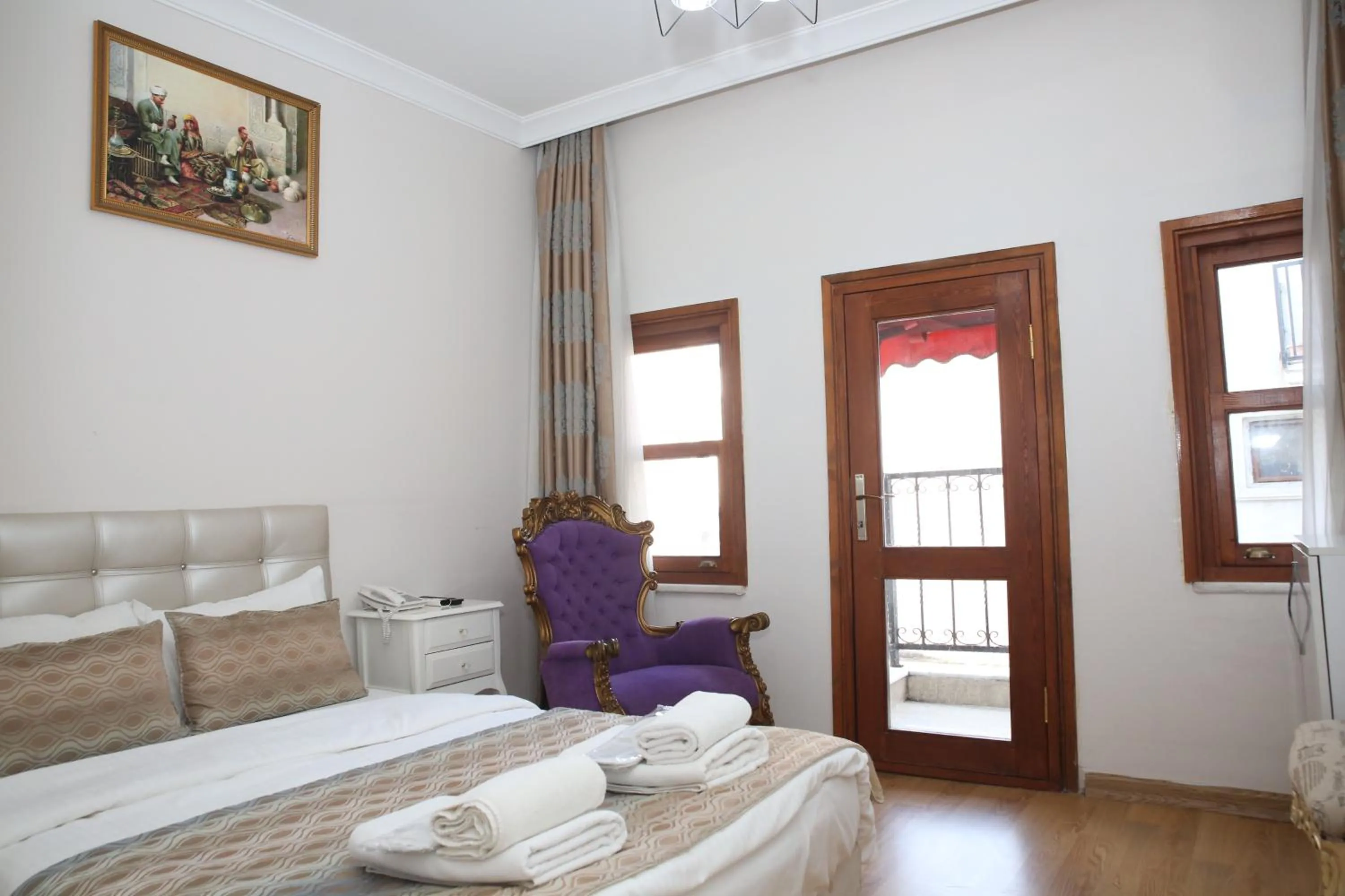 Bed in Rosalie Palace Hotel