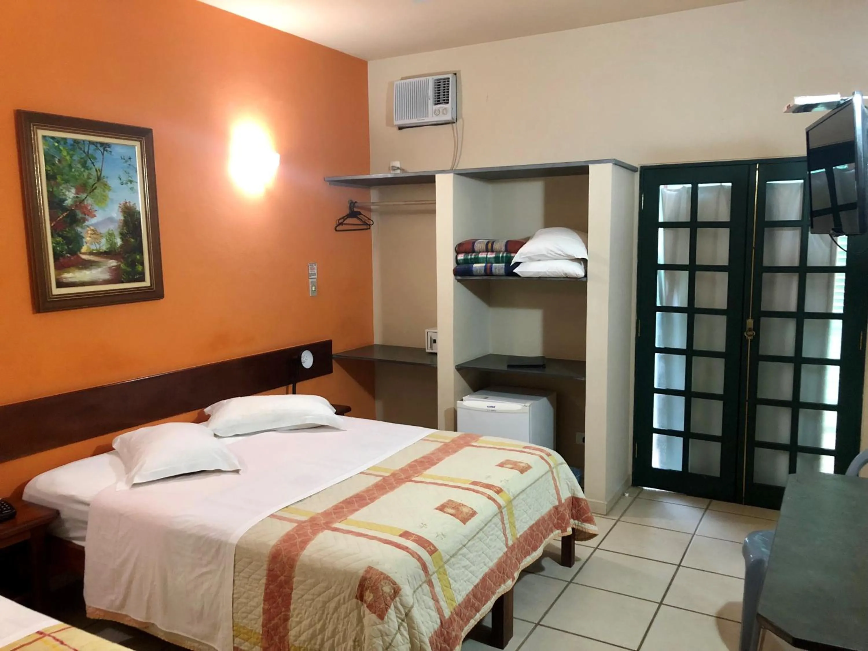 Photo of the whole room, Bed in Pousada Villa Harmonia