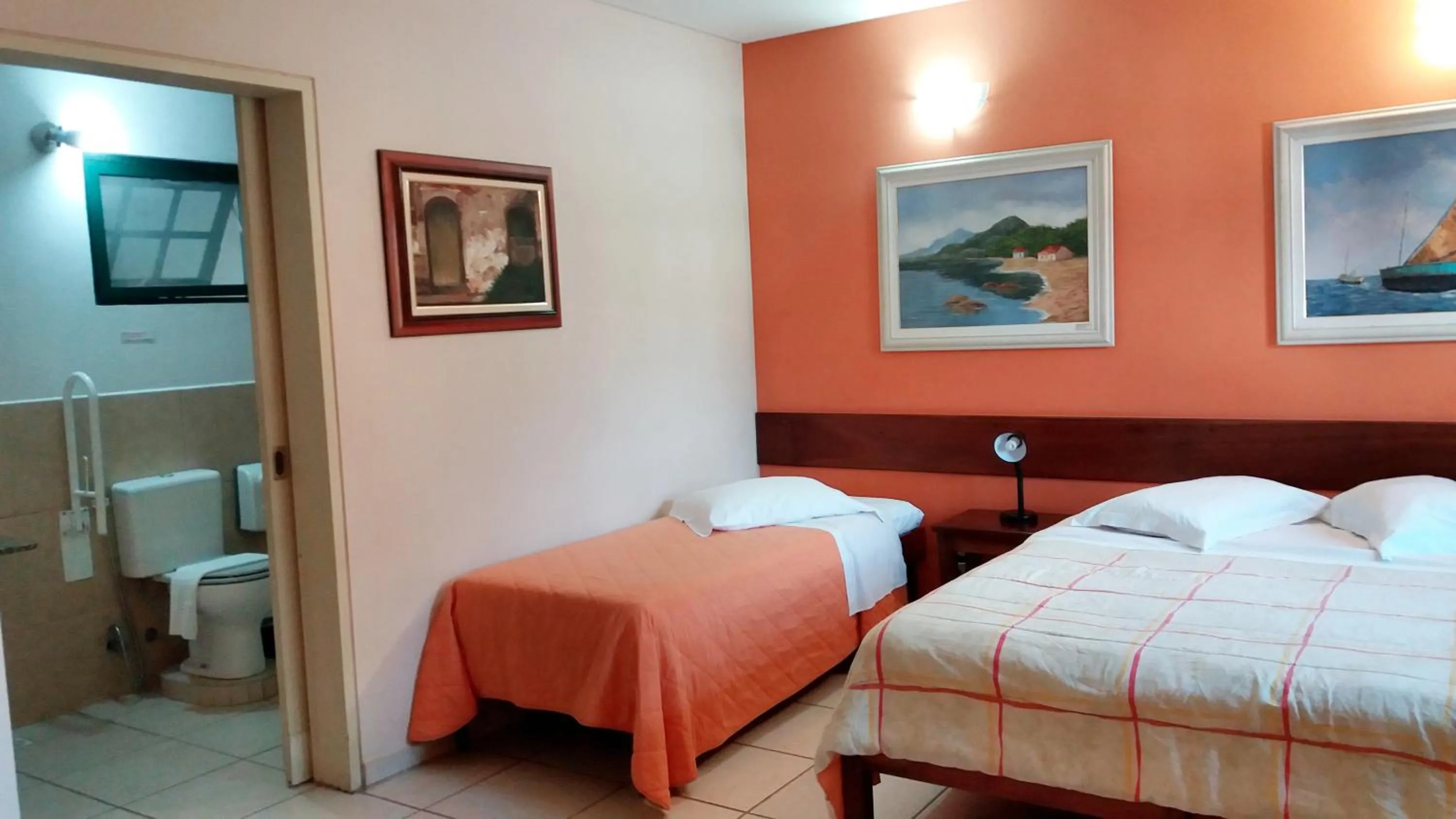 Photo of the whole room, Bed in Pousada Villa Harmonia