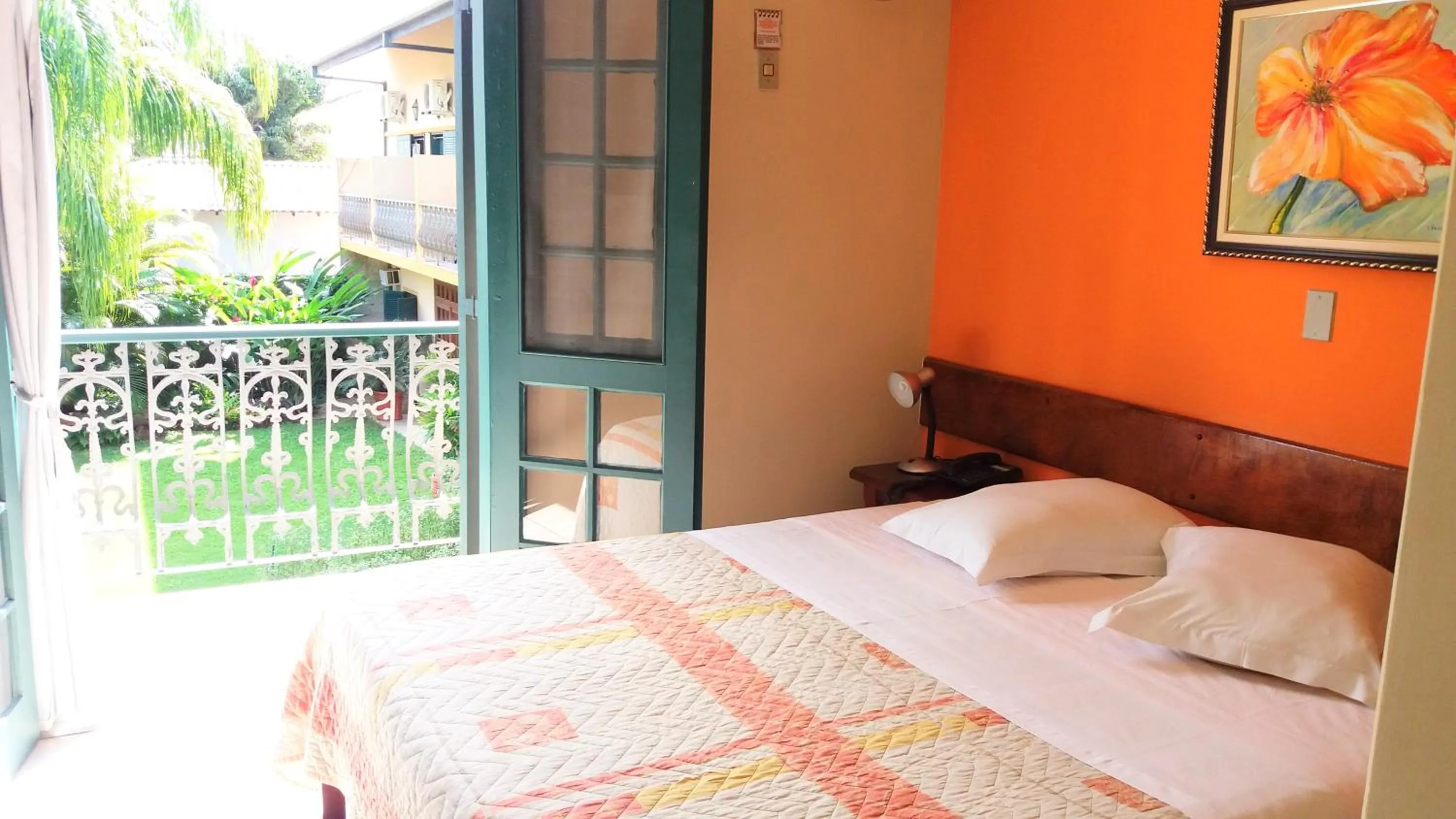 Photo of the whole room, Bed in Pousada Villa Harmonia