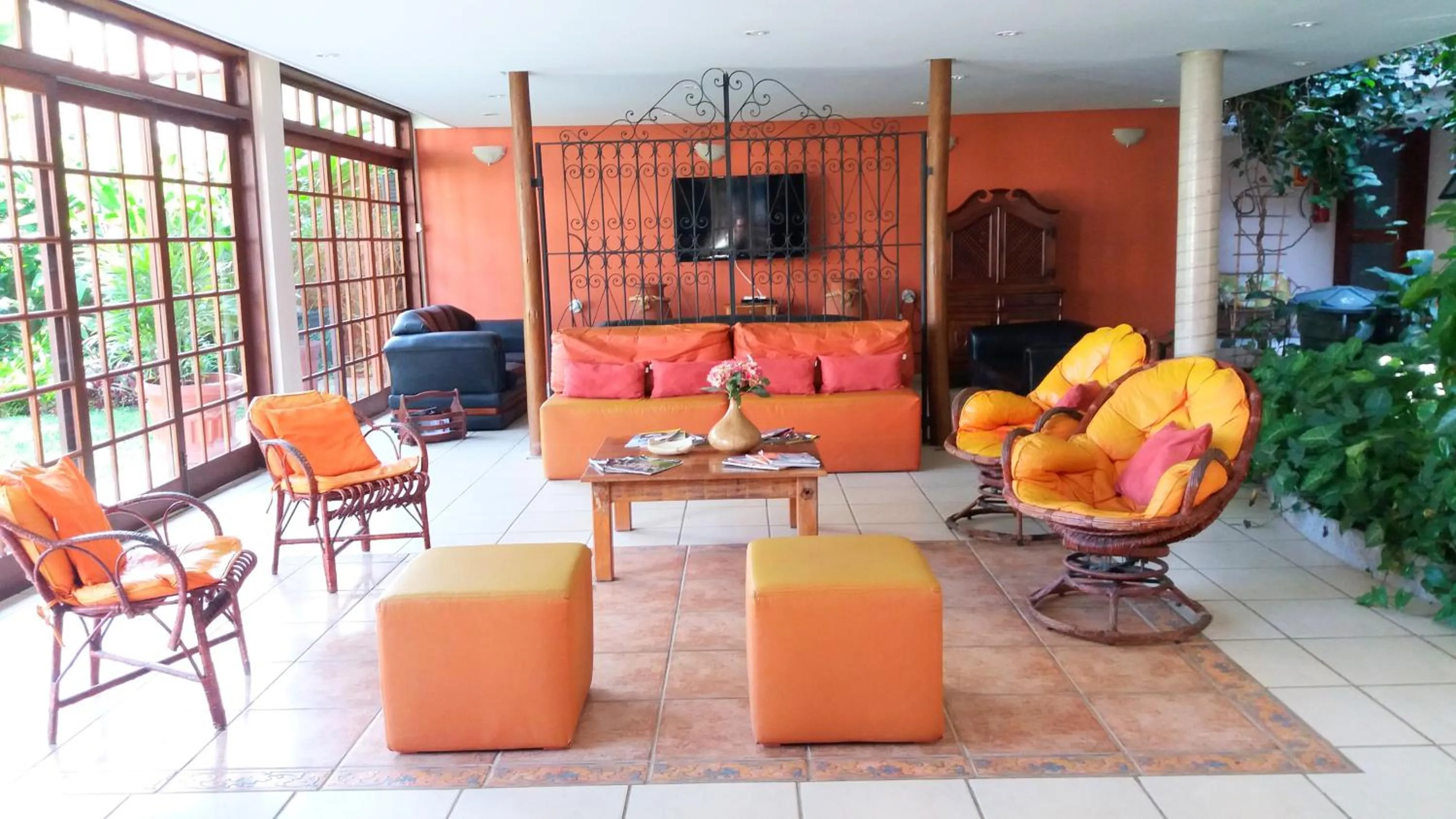 Communal lounge/ TV room in Pousada Villa Harmonia