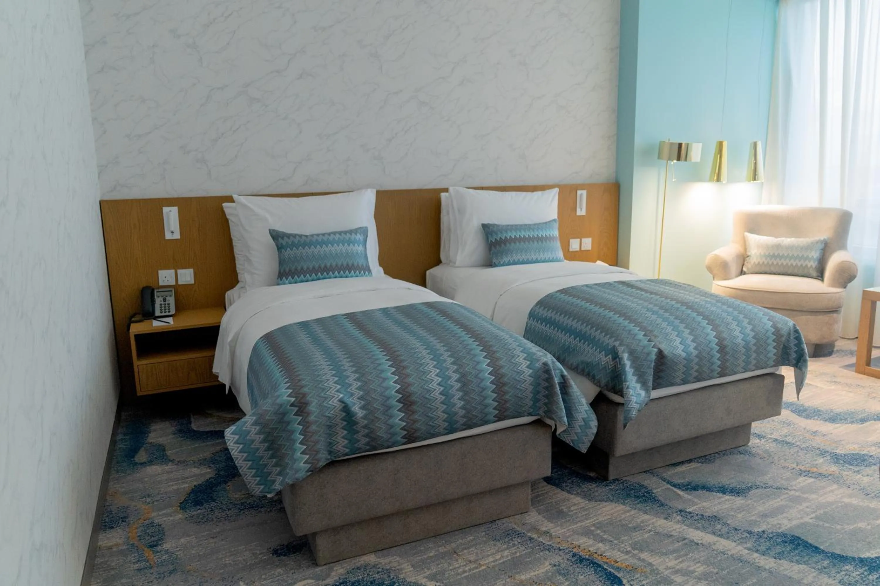 Bed in Symphony Style Hotel Kuwait