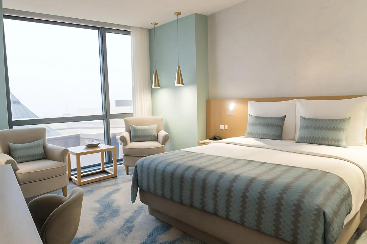 Bed in Symphony Style Hotel Kuwait