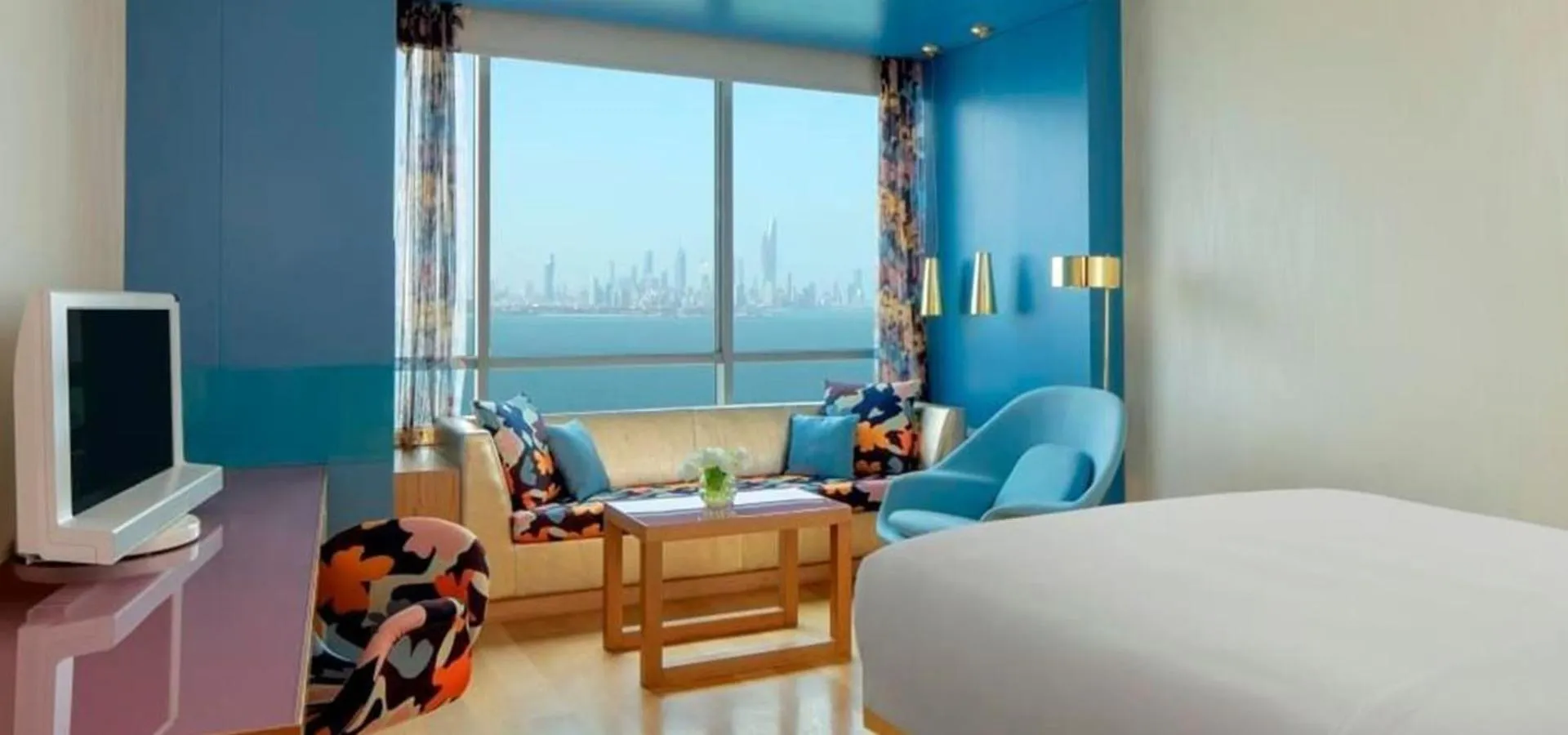 Living room, Bed in Symphony Style Hotel Kuwait