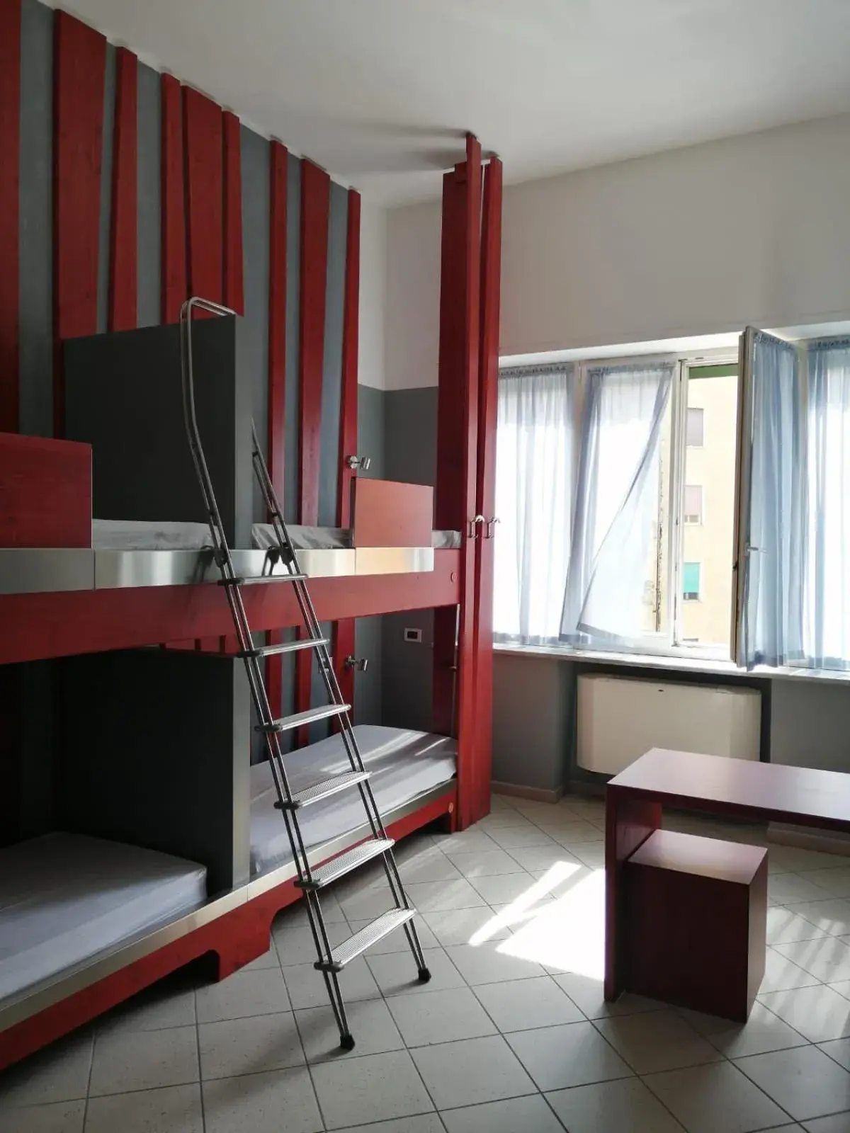 Single Bed in Male Dormitory Room with External Bathroom in Roma Scout Center Single Bed in Male Dormitory Room with External Bathroom in Roma Scout Center