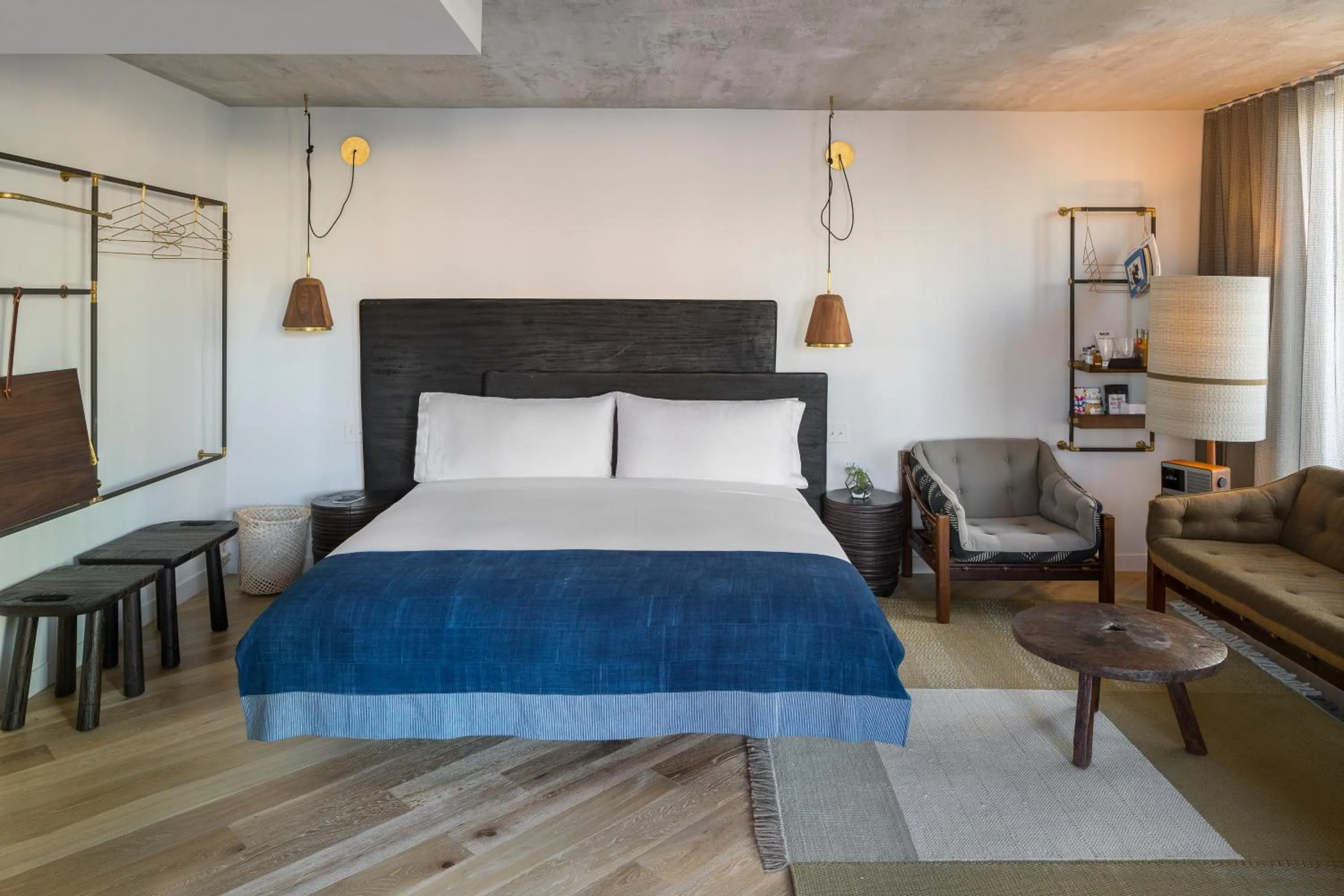 Seating area, Bed in MADE Hotel