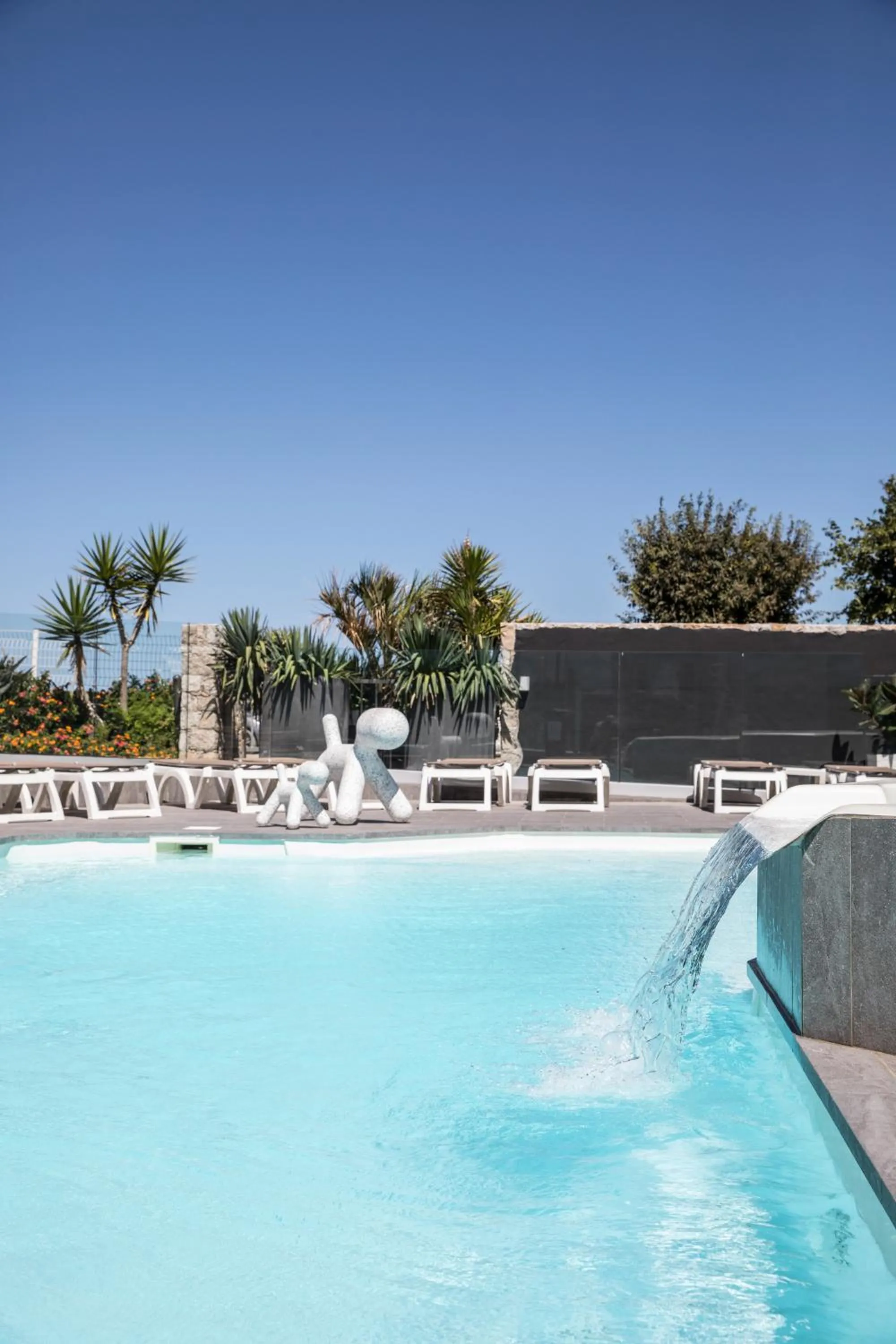 Swimming pool in Hotel Revellata & Spa