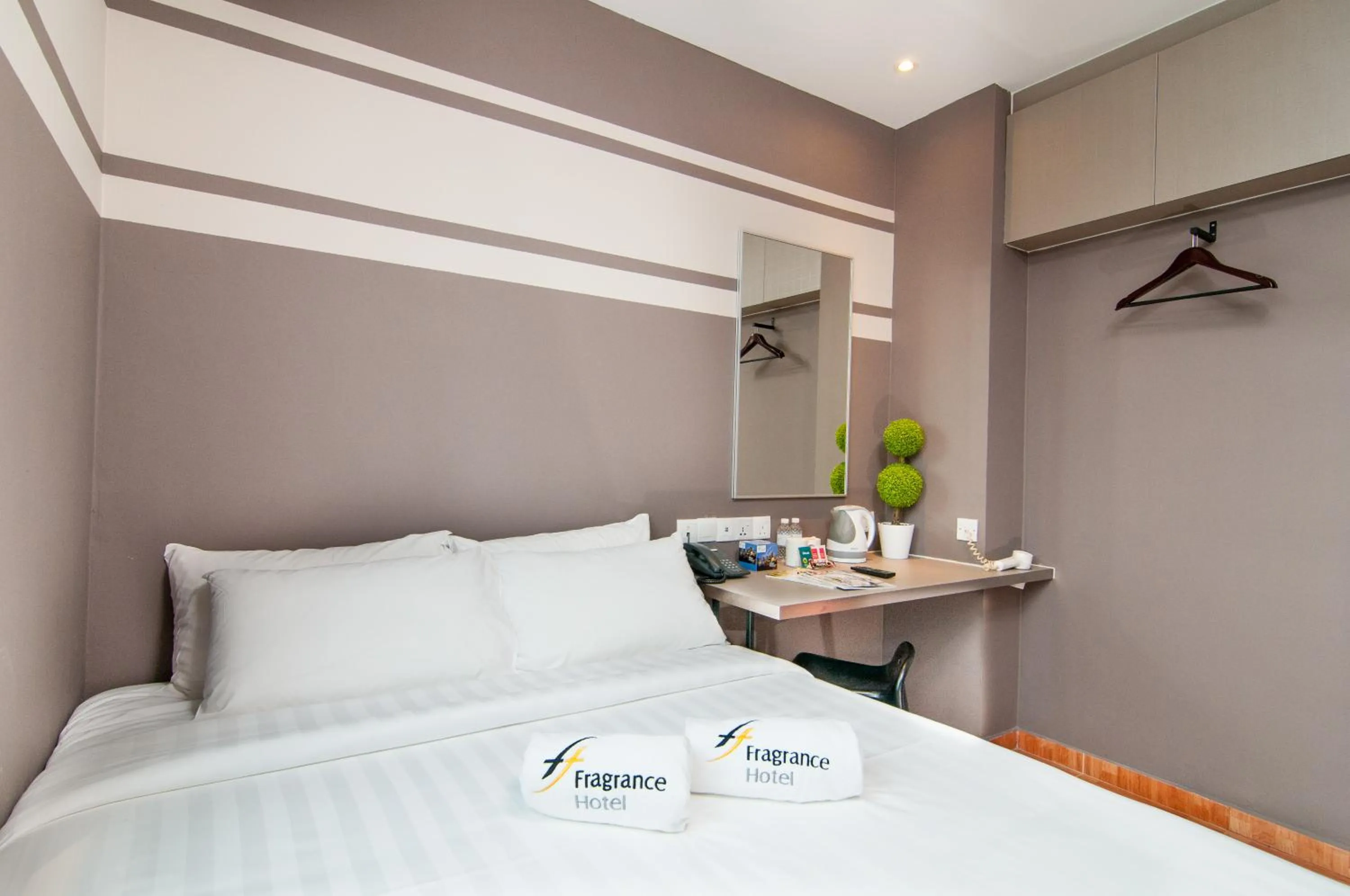 Photo of the whole room, Bed in Fragrance Hotel - Kovan