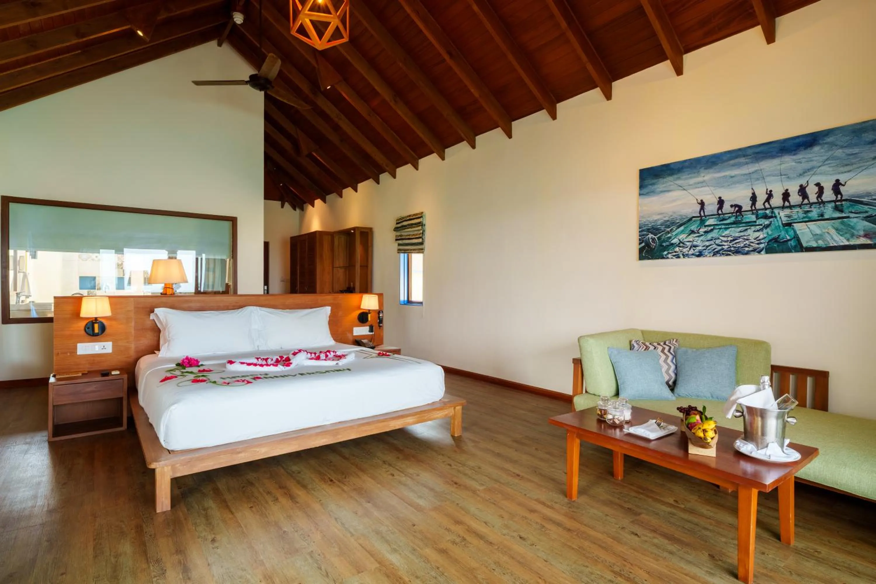Bed in Reethi Faru Resort