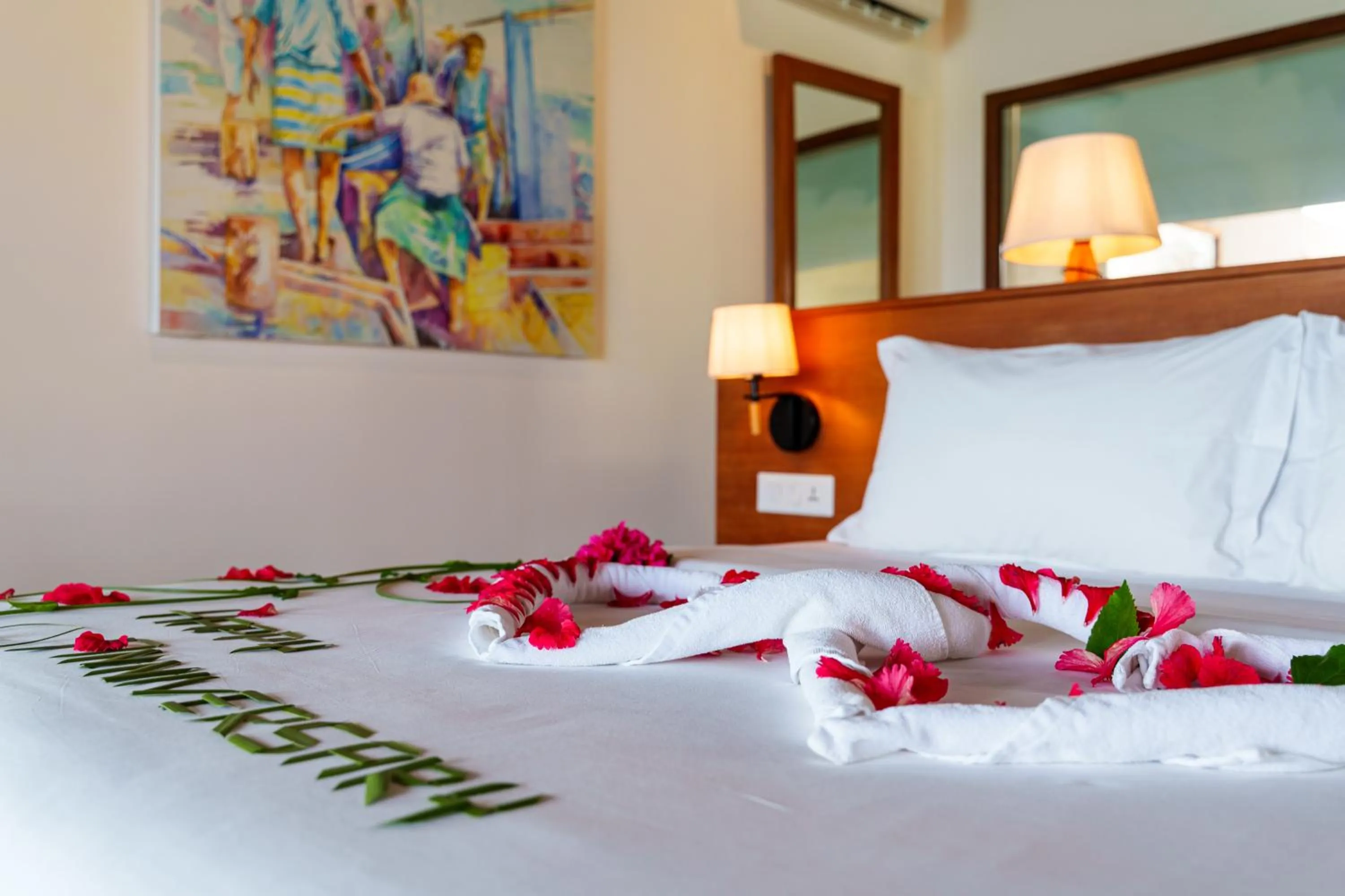 Bed in Reethi Faru Resort