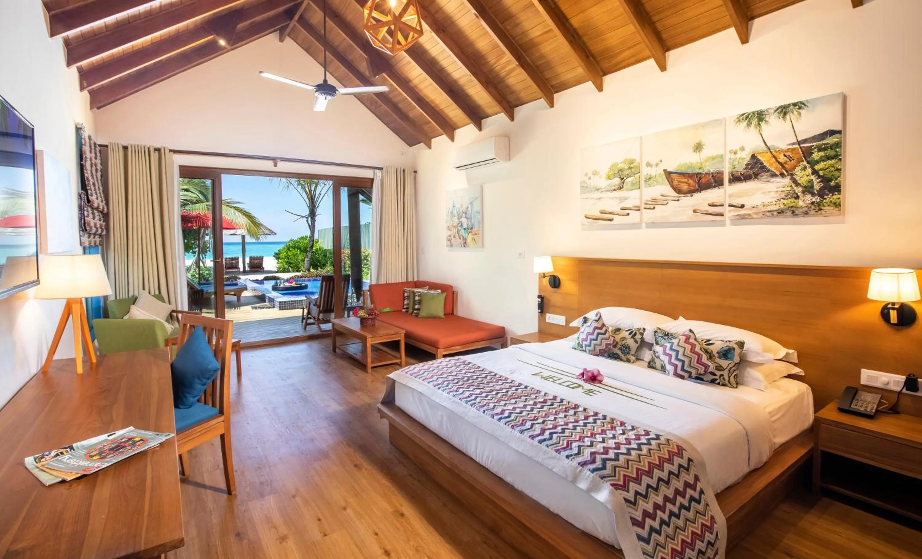 Bed in Reethi Faru Resort