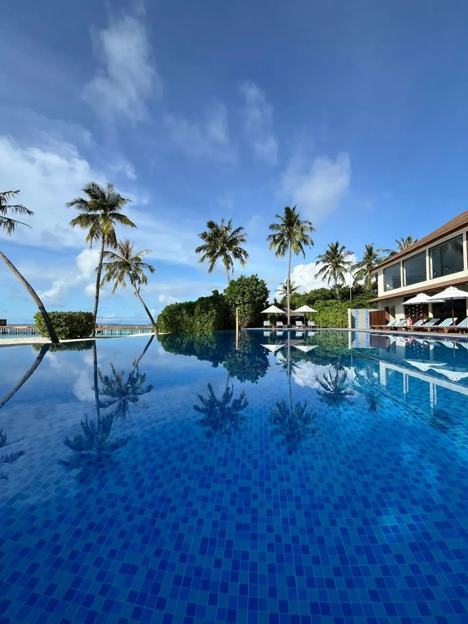 Swimming pool in Reethi Faru Resort - Stay 5 Nights or more Between Aug to Oct 2025 & Enjoy a Free Sunset Cruise Swimming pool in Reethi Faru Resort - Stay 5 Nights or more Between Aug to Oct 2025 & Enjoy a Free Sunset Cruise