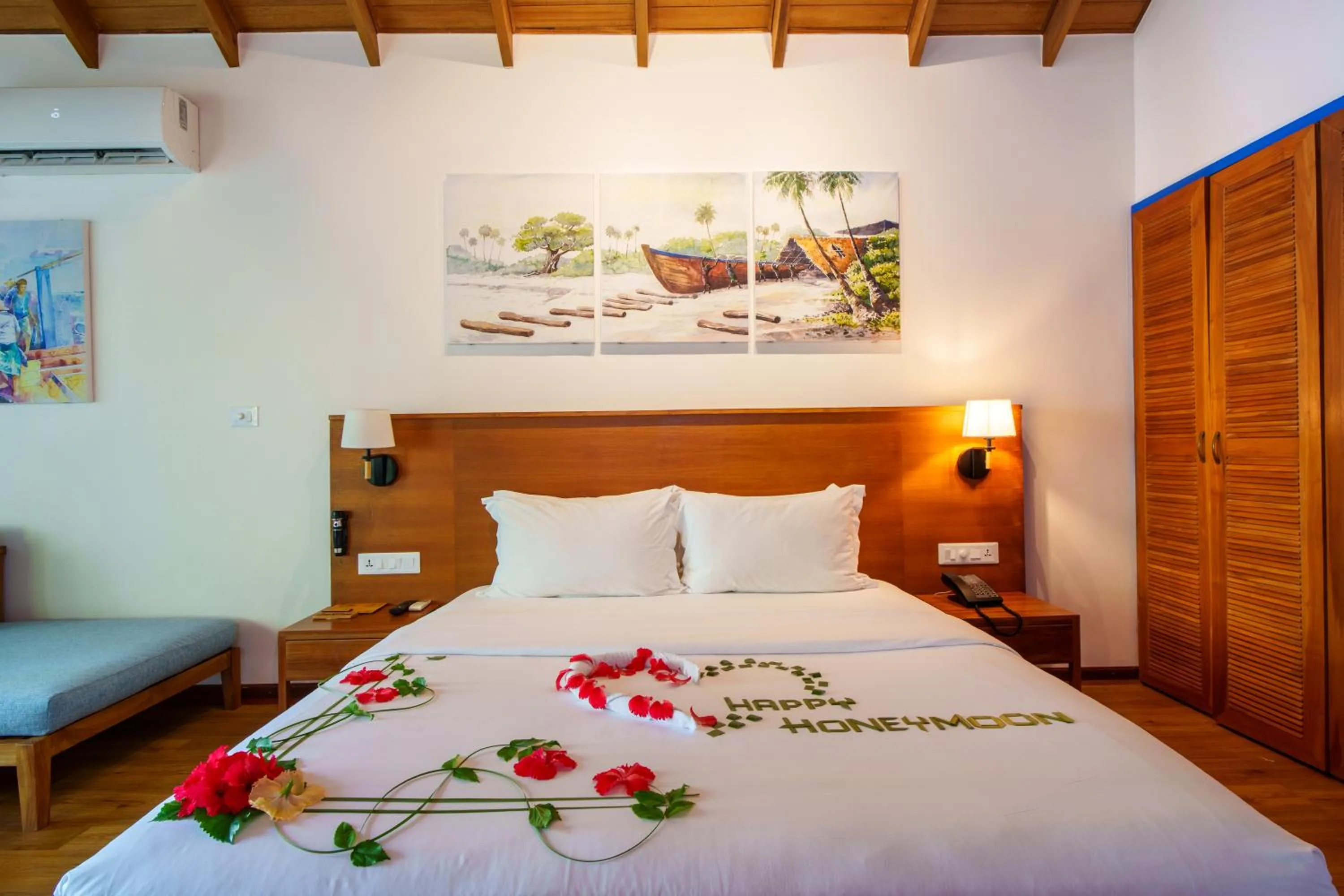Bed in Reethi Faru Resort