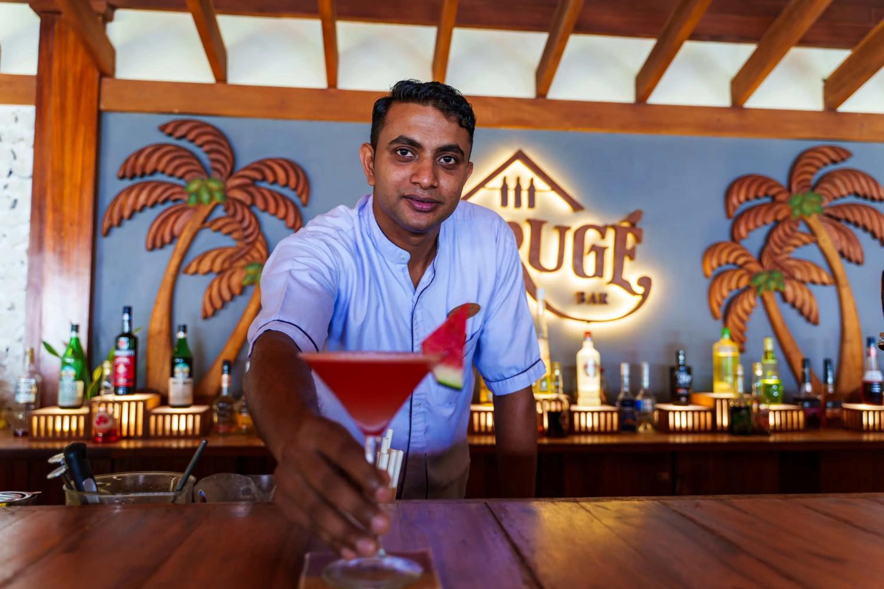 Lounge or bar in Reethi Faru Resort