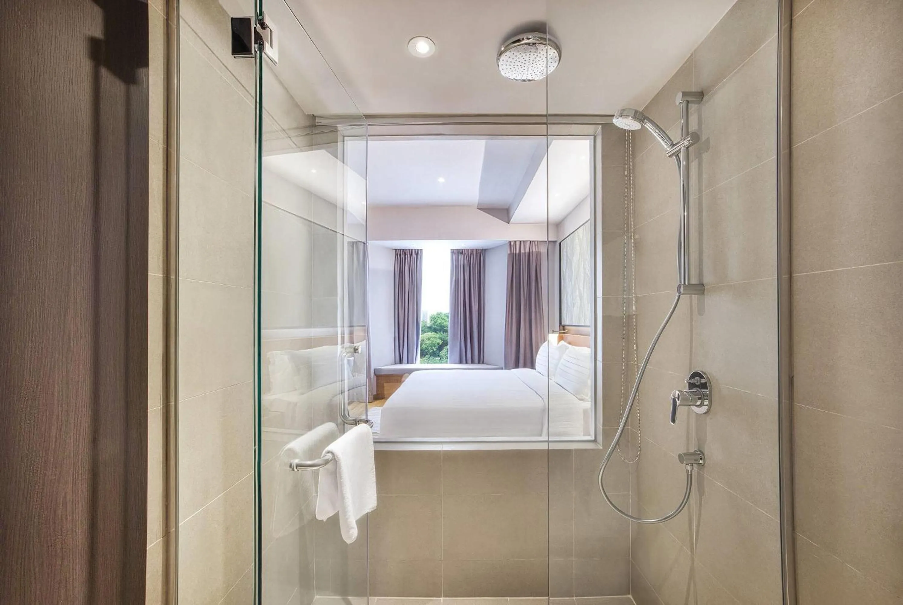 Bathroom, Bed in Wyndham Singapore Hotel