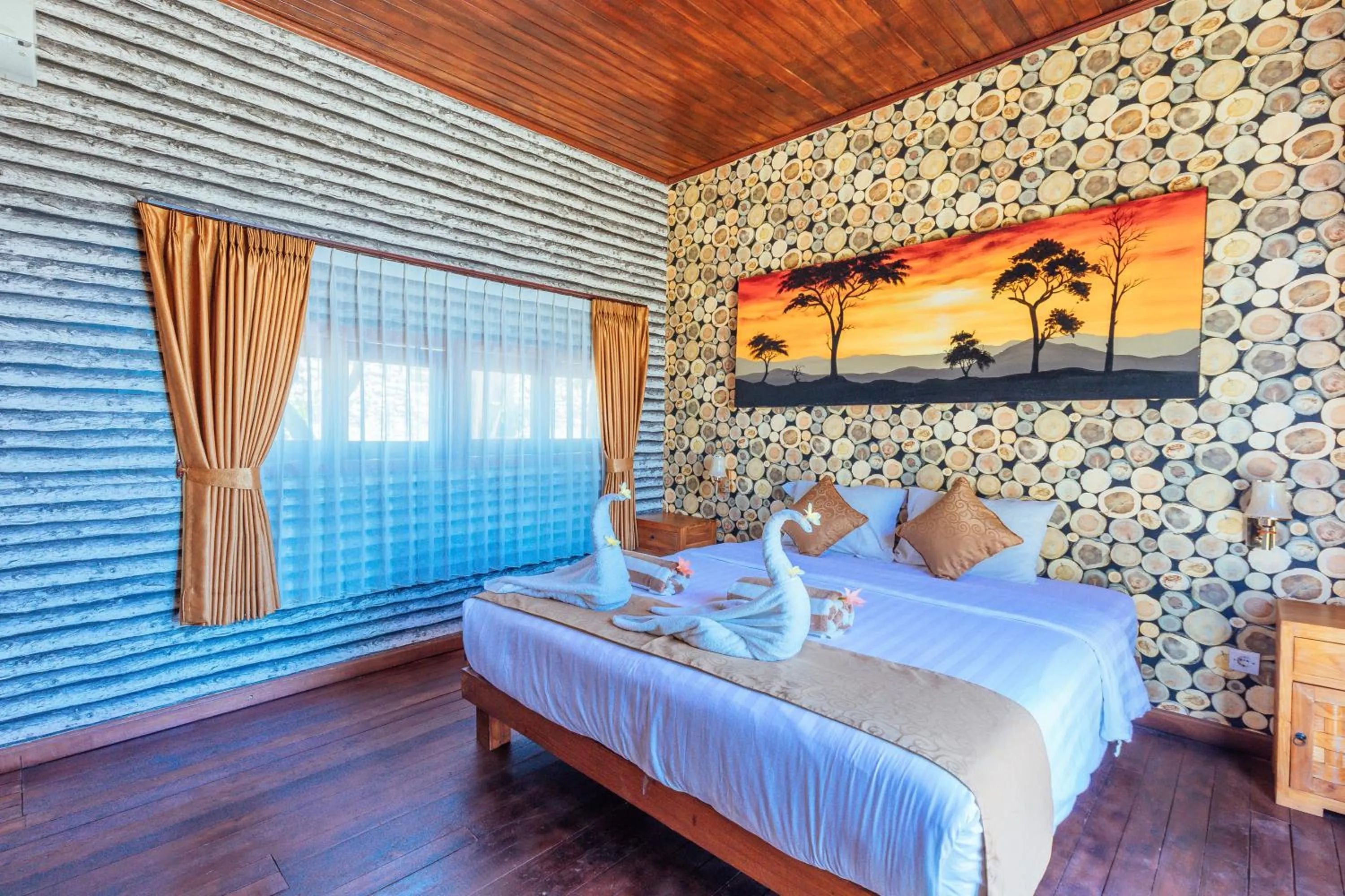 Bed in Kabeh Jati Garden Villa & Restaurant