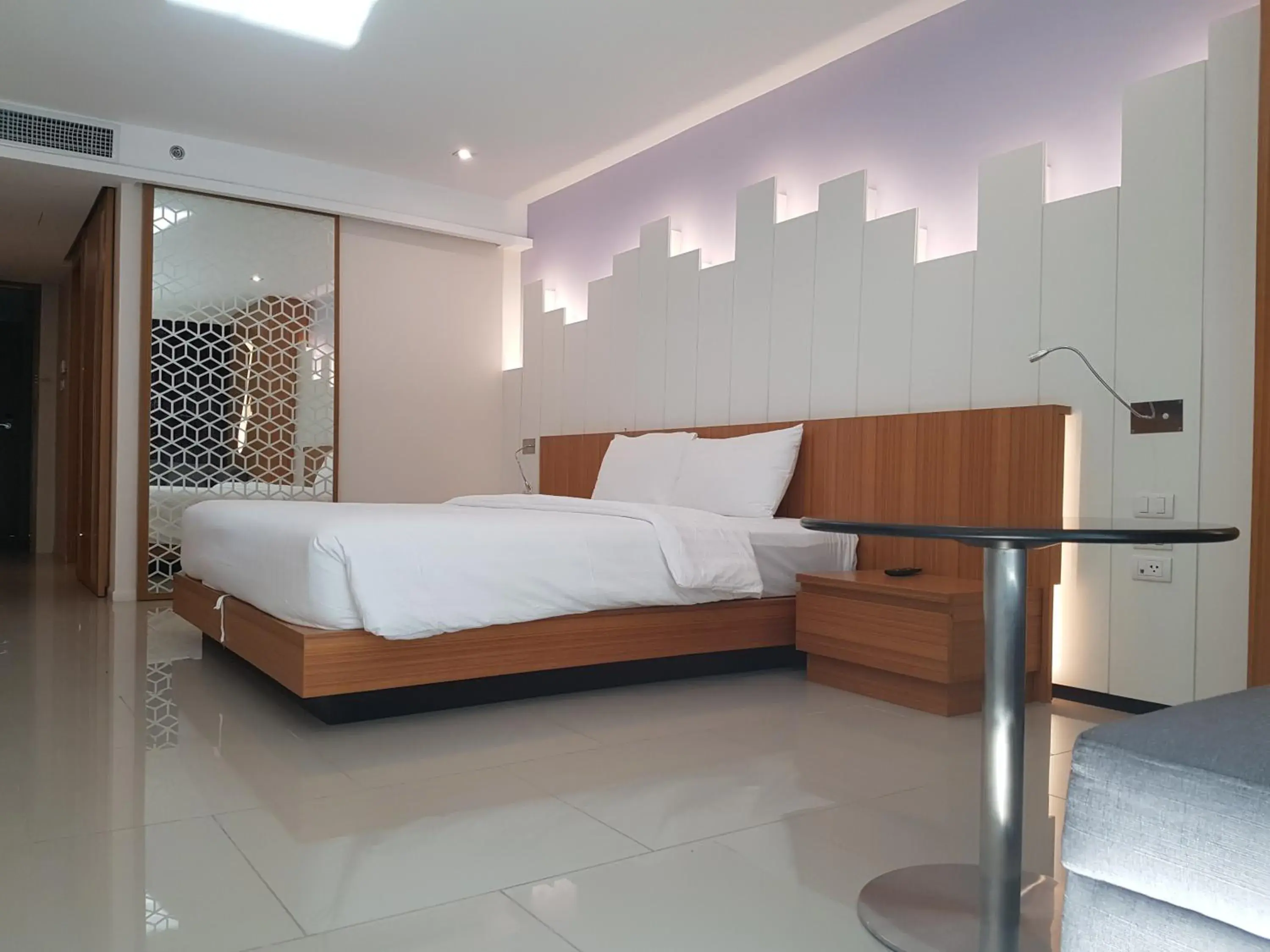 Bed in The Whisper Hotel Bed in The Whisper Hotel