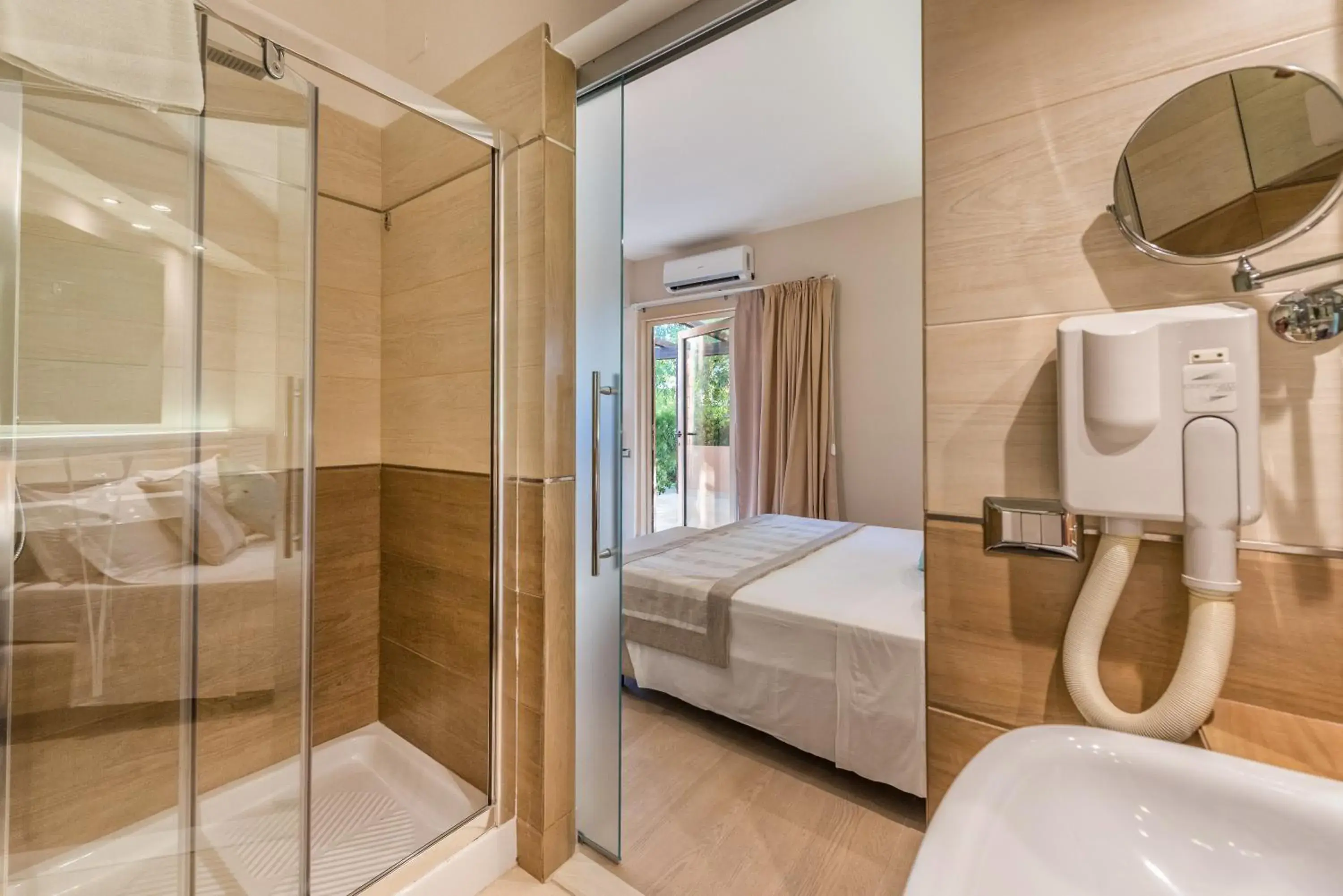 Bed in Acacia Resort Parco Dei Leoni Bed in Acacia Resort Parco Dei Leoni