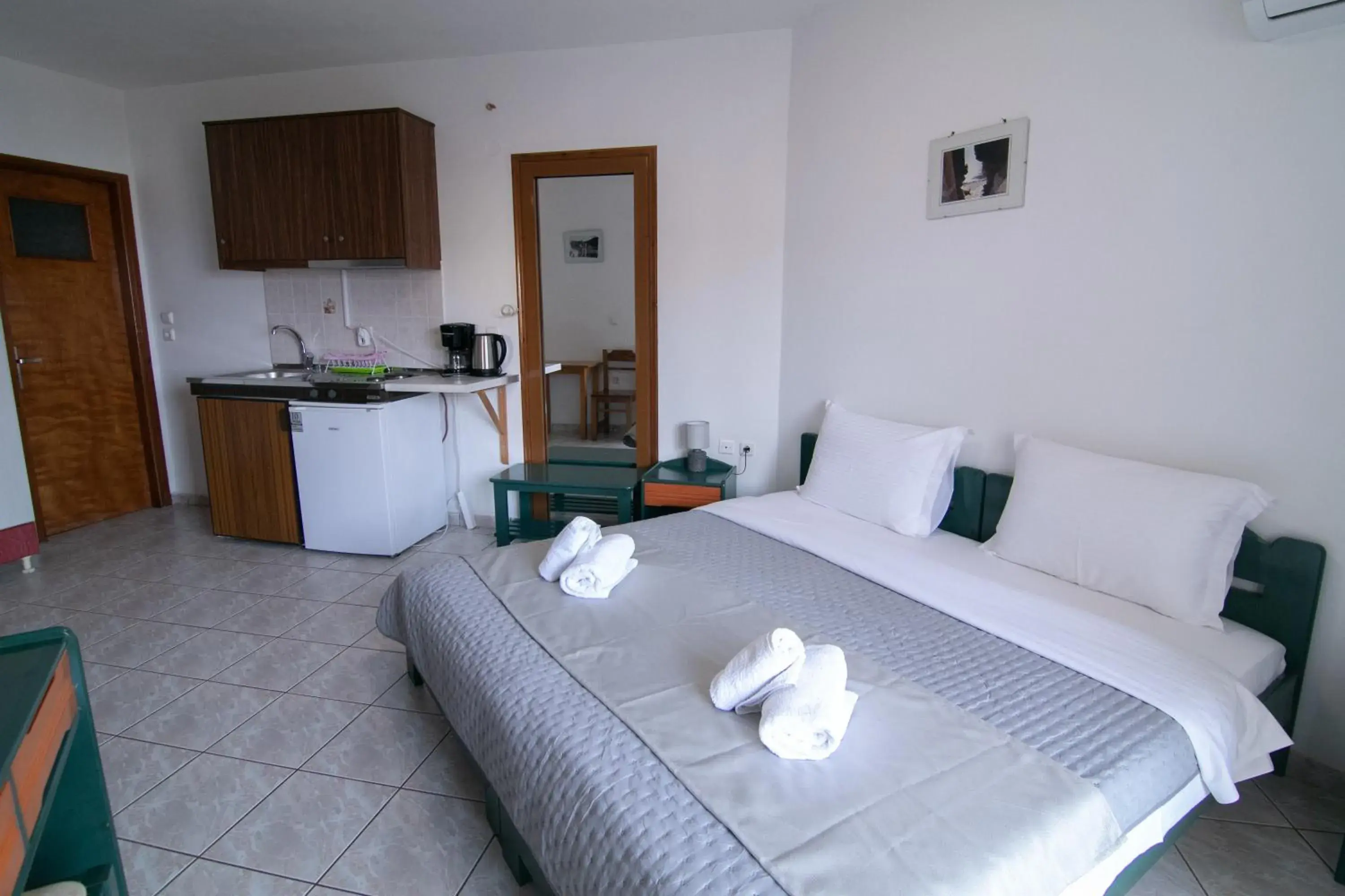 Bed in Malvasia Corner Studios - ex Romeo's House Bed in Malvasia Corner Studios - ex Romeo's House