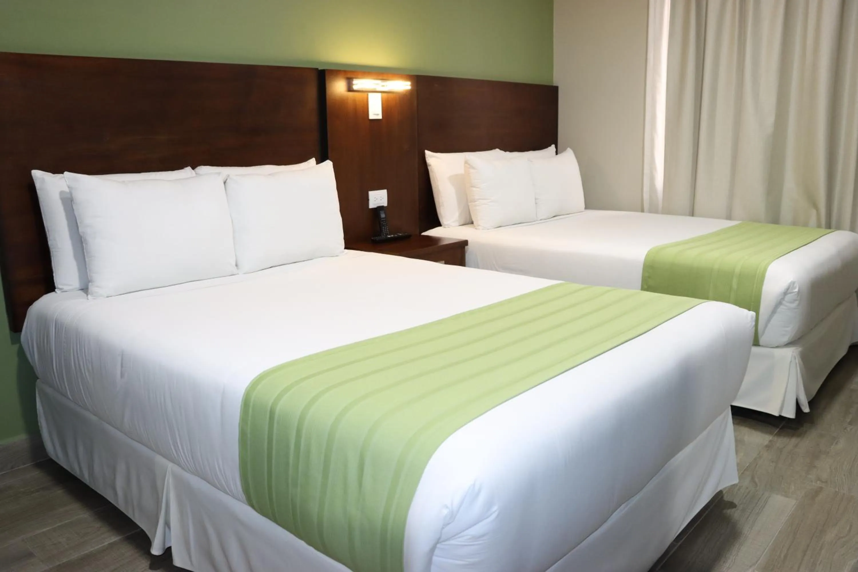 Bed in Hotel San Agustin Plaza