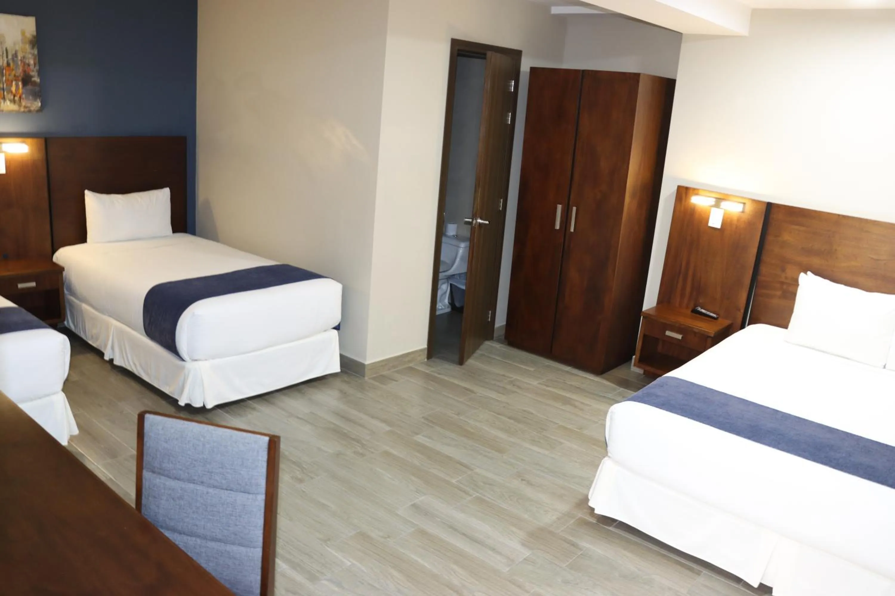 Bed in Hotel San Agustin Plaza