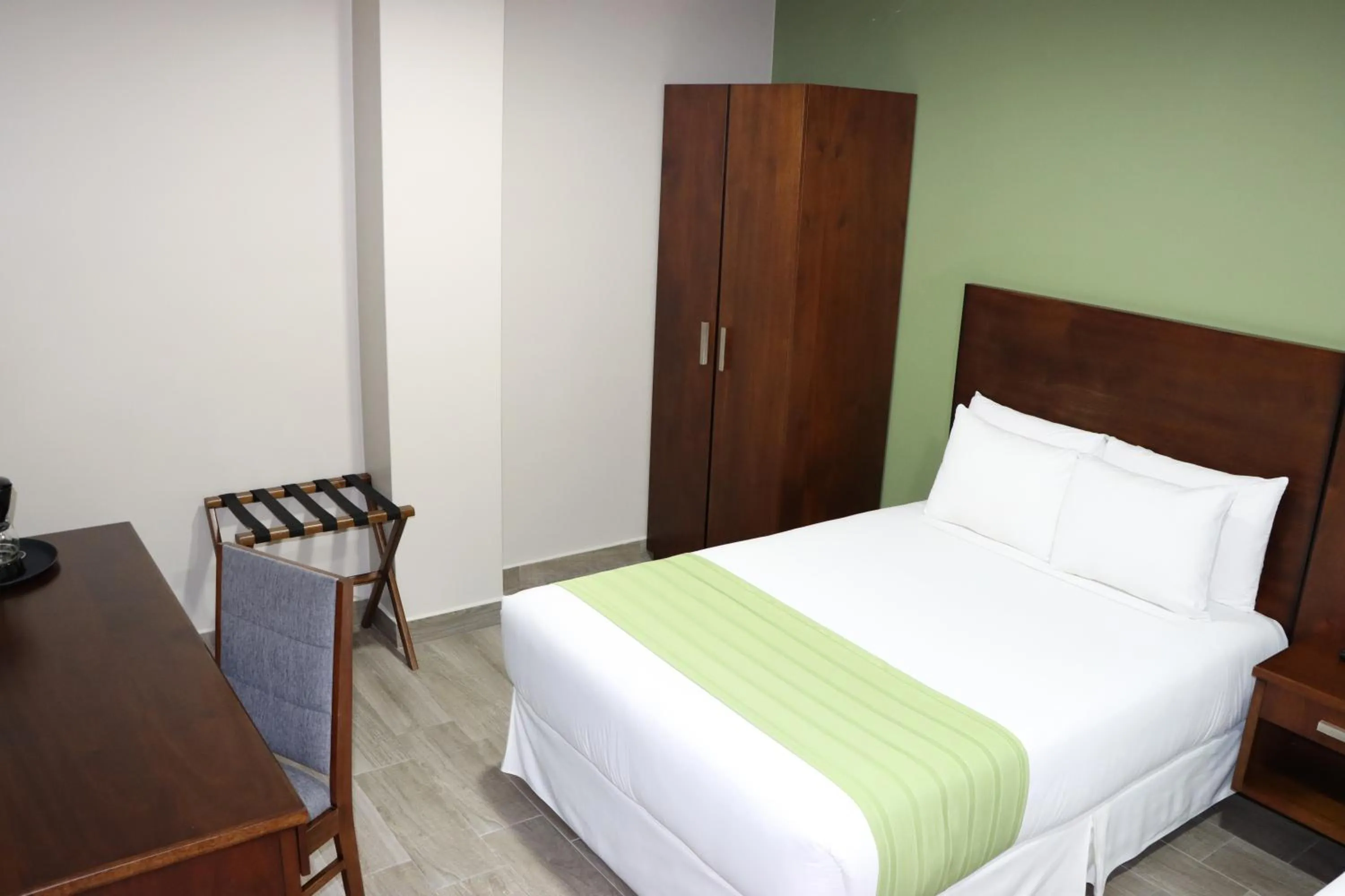 Bed in Hotel San Agustin Plaza