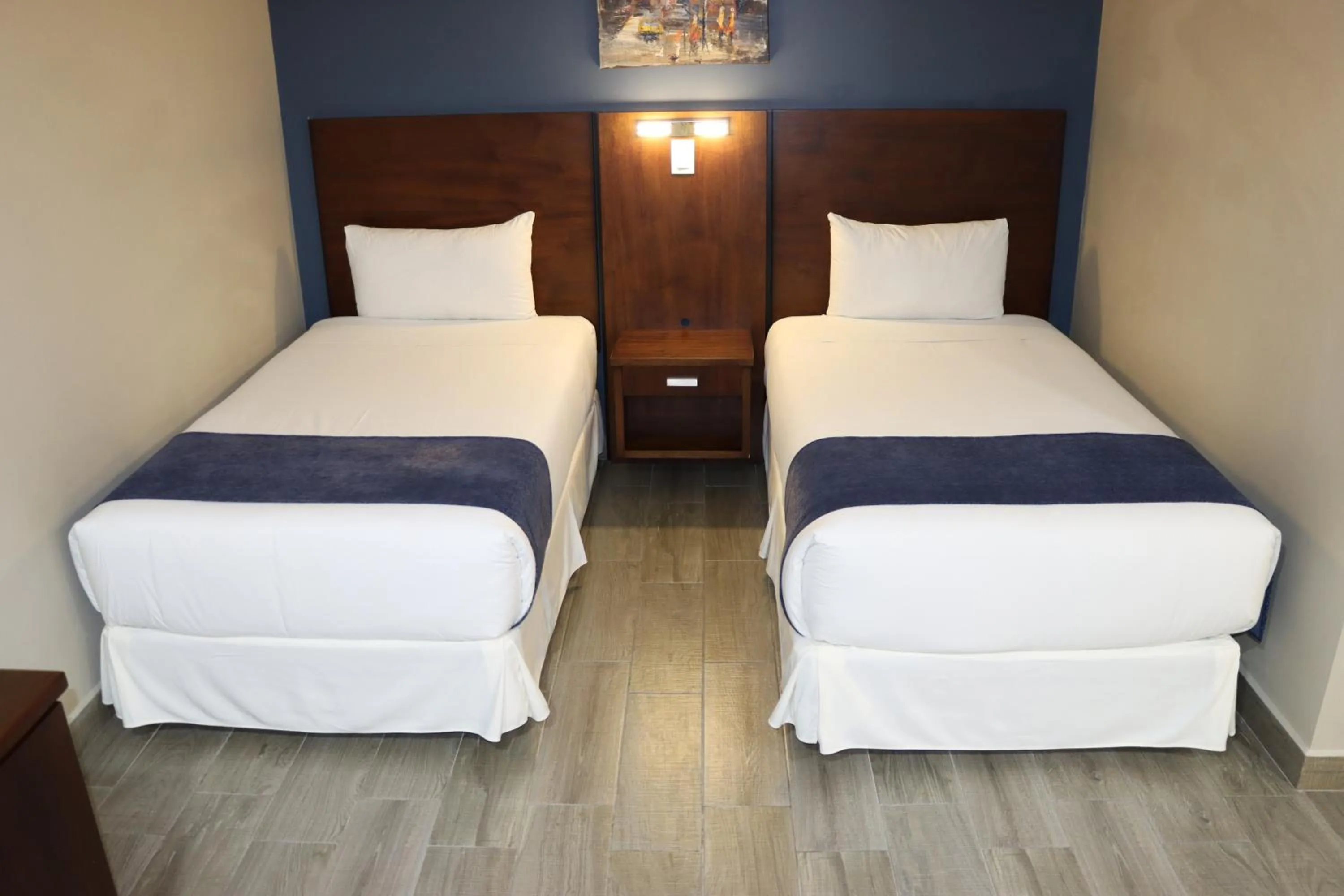 Bed in Hotel San Agustin Plaza