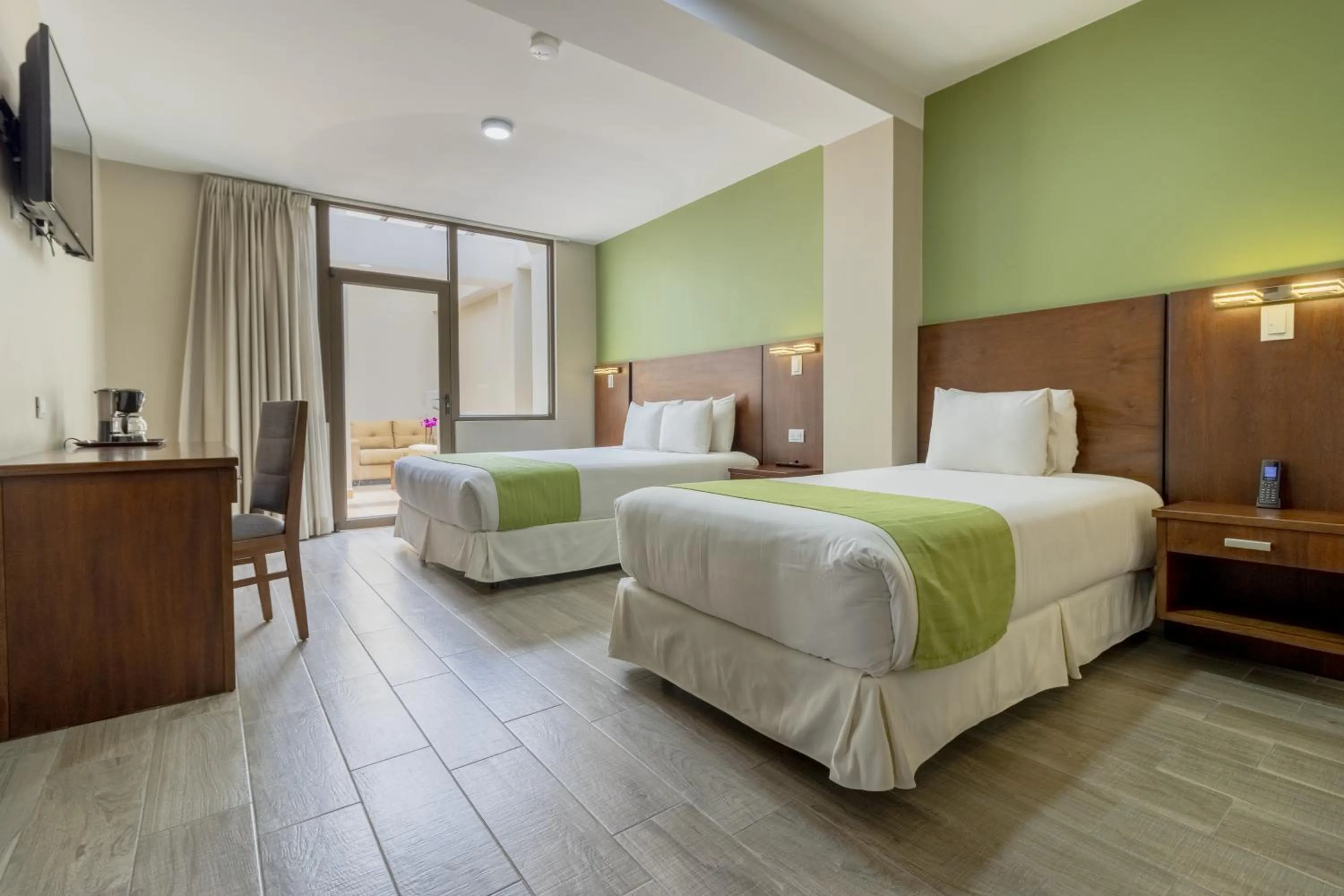 Bed in Hotel San Agustin Plaza