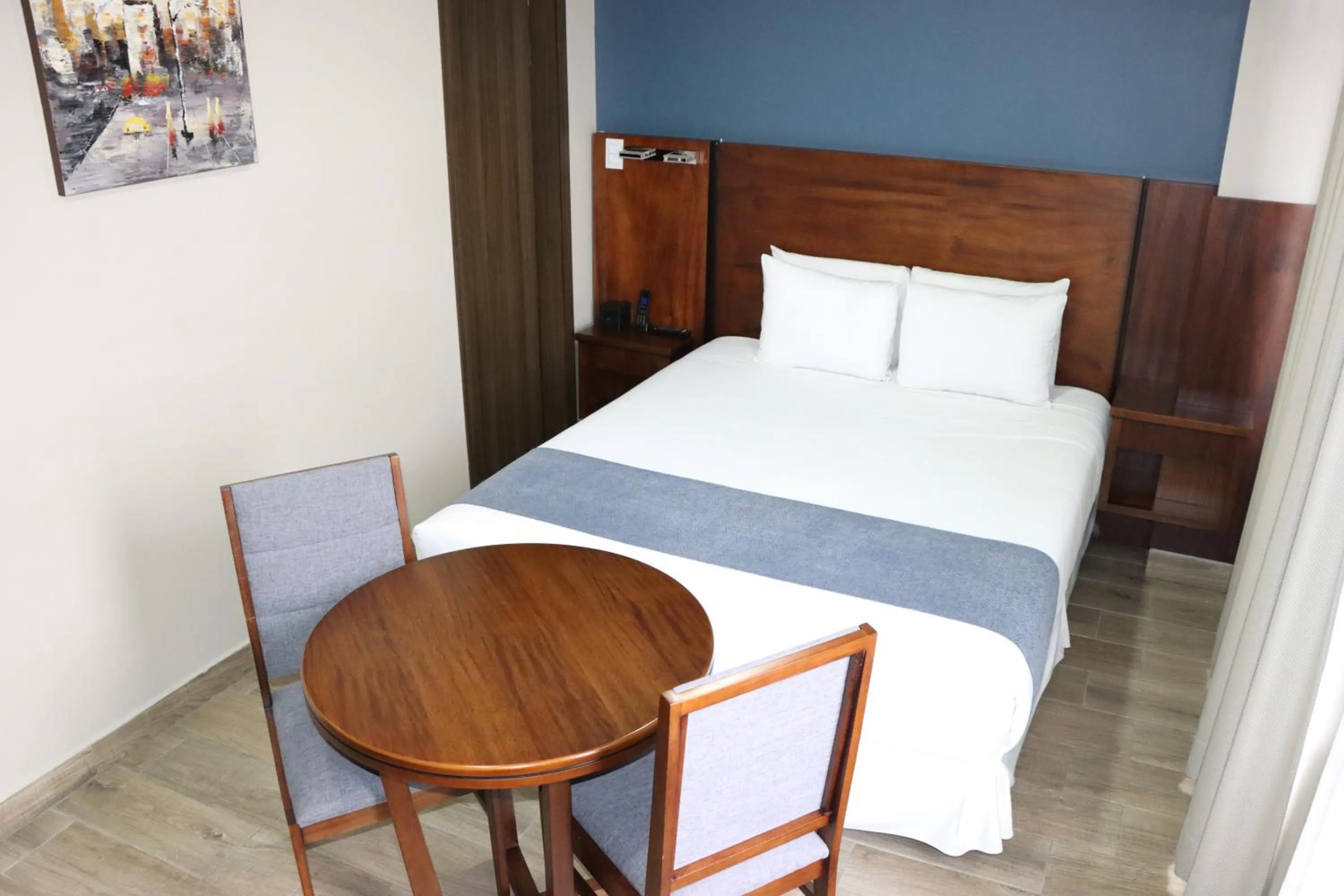 Bed in Hotel San Agustin Plaza