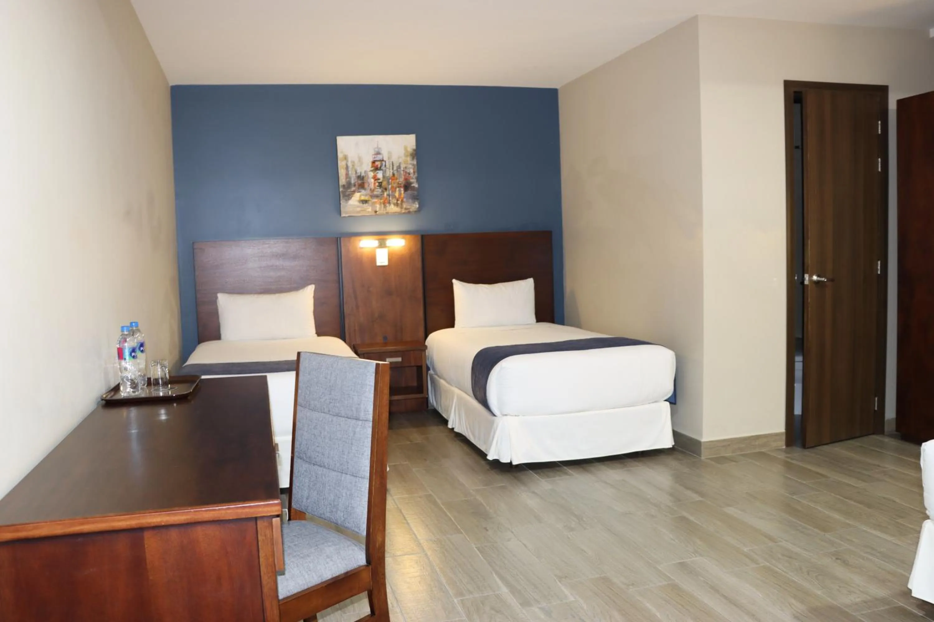 Bed in Hotel San Agustin Plaza