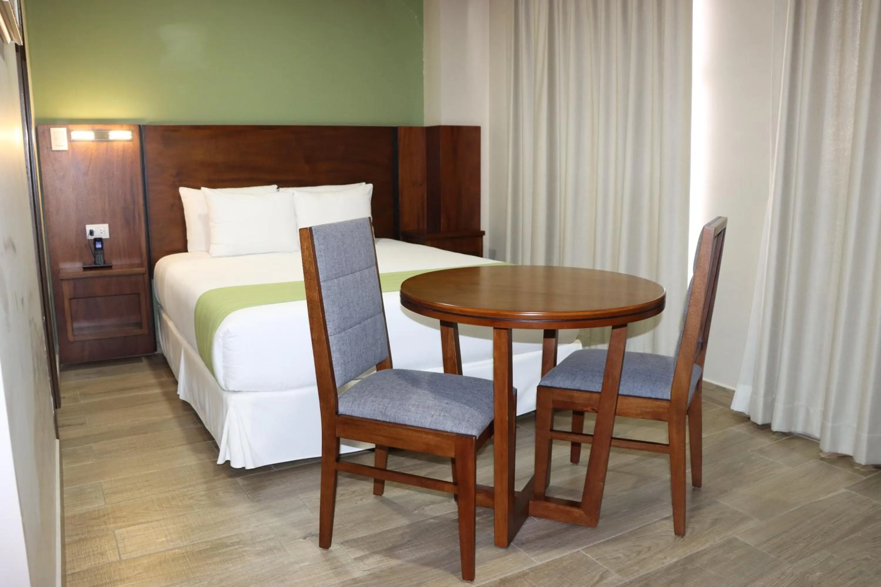 Bed in Hotel San Agustin Plaza