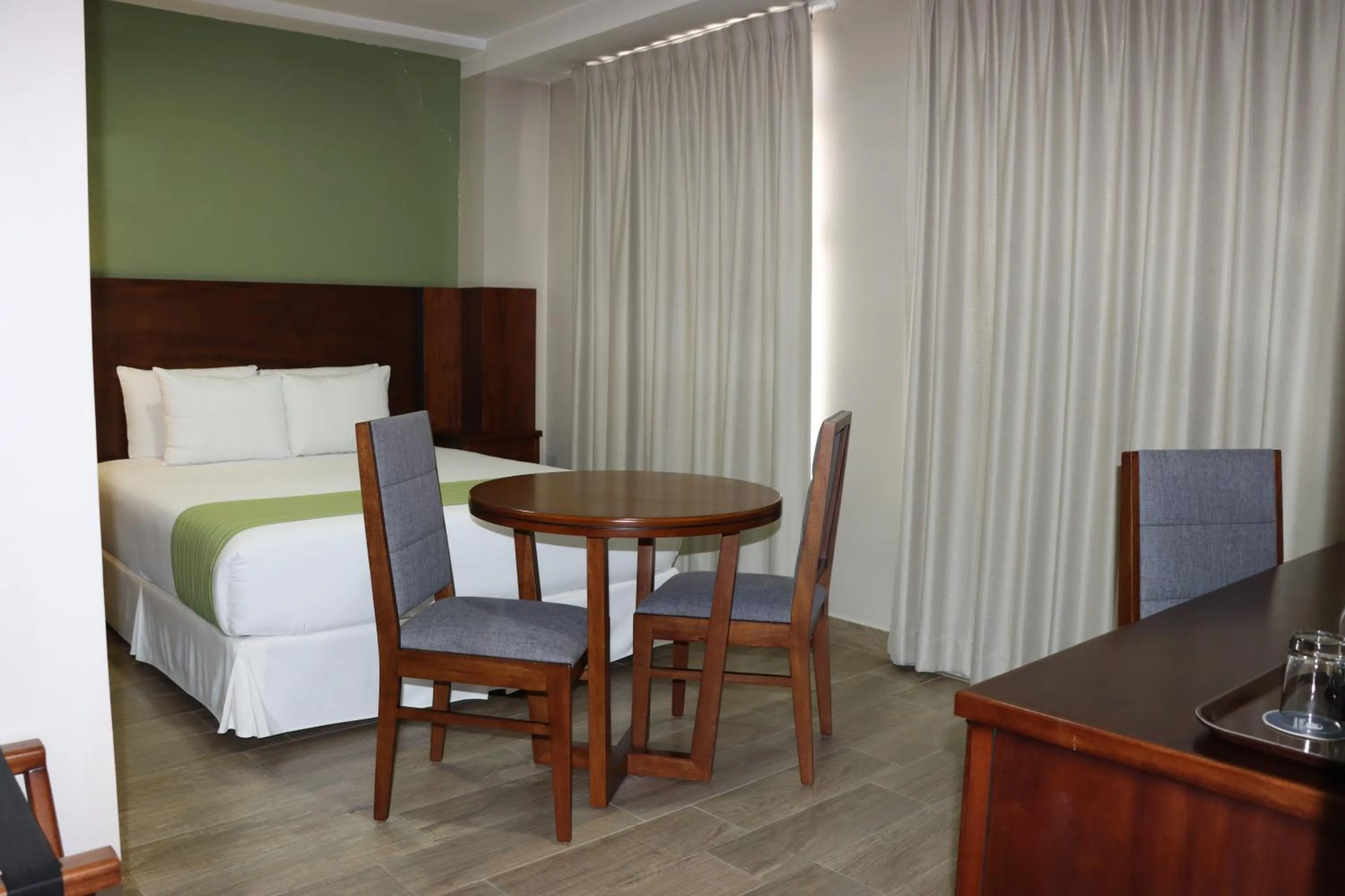 Bed in Hotel San Agustin Plaza