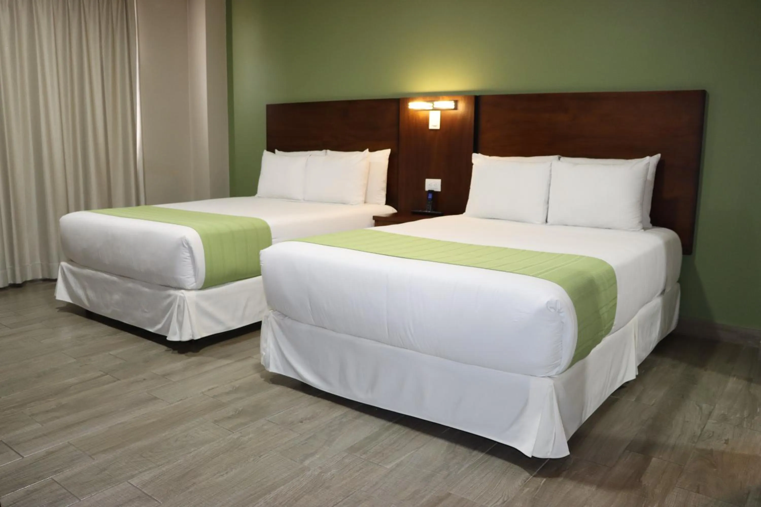 Bed in Hotel San Agustin Plaza