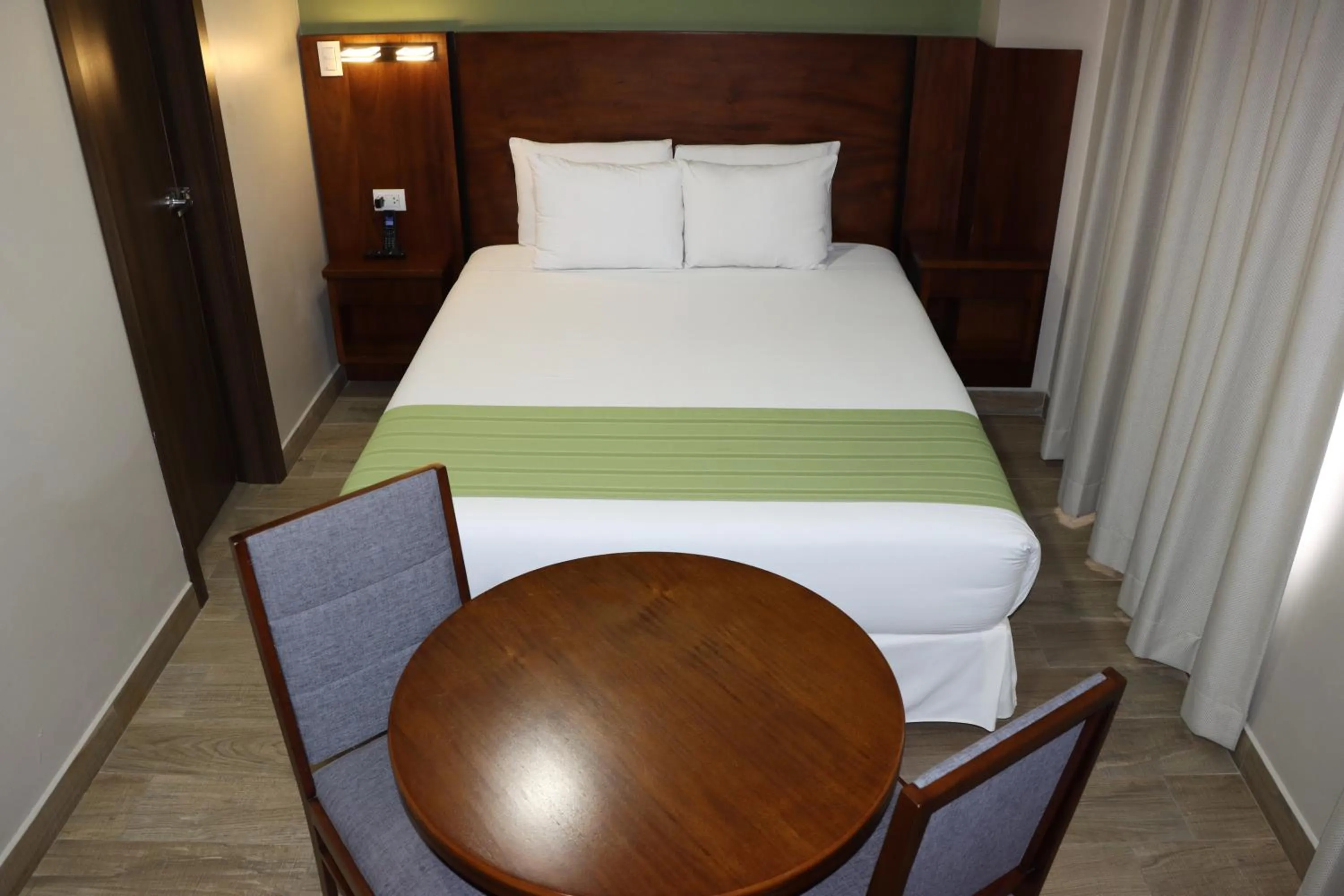 Bed in Hotel San Agustin Plaza
