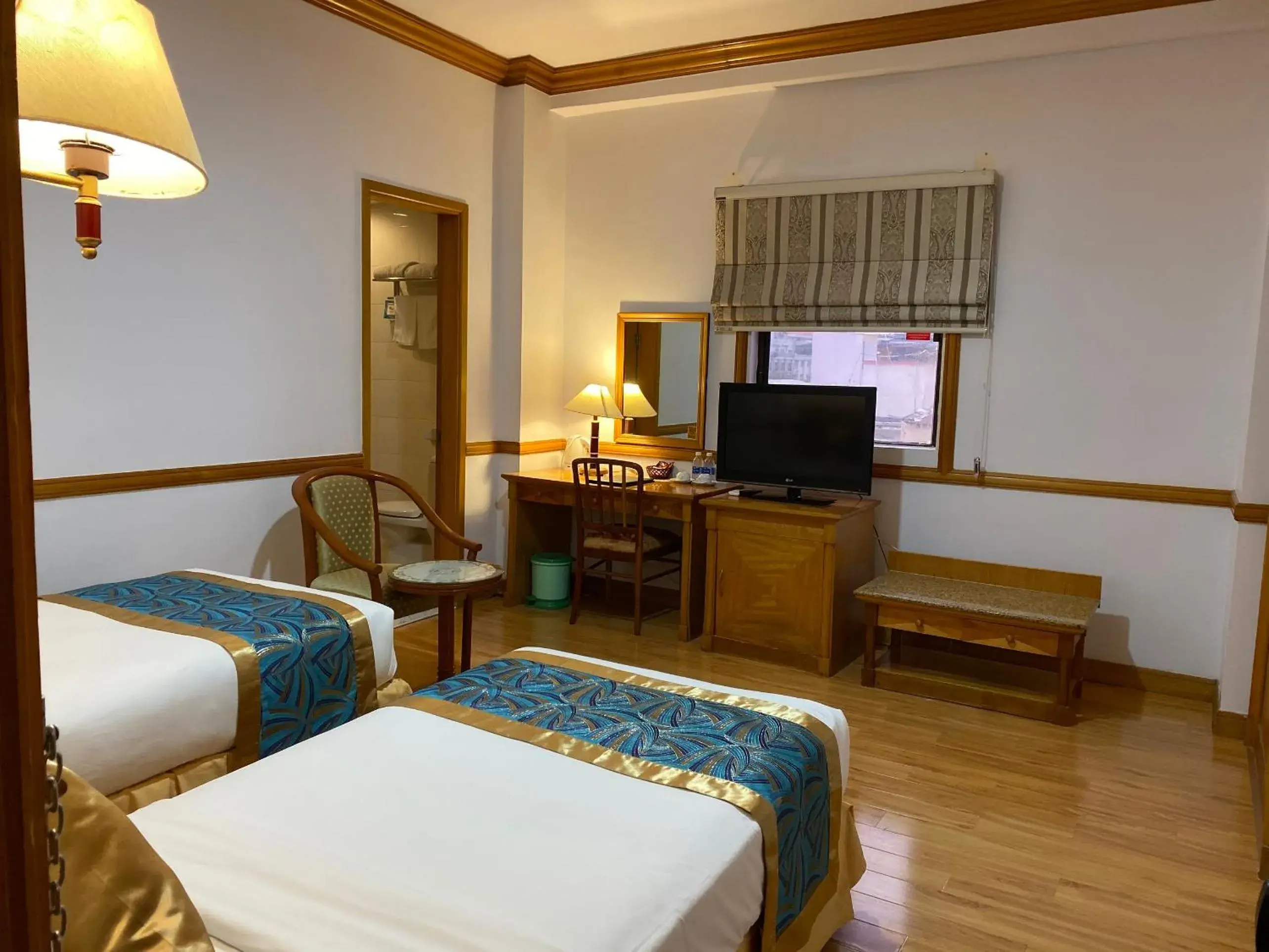 Photo of the whole room, Bed in Oscar Saigon Hotel Photo of the whole room, Bed in Oscar Saigon Hotel