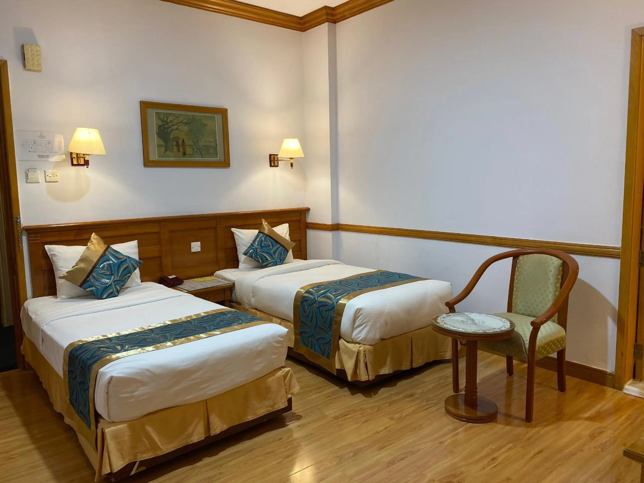 Bed in Oscar Saigon Hotel