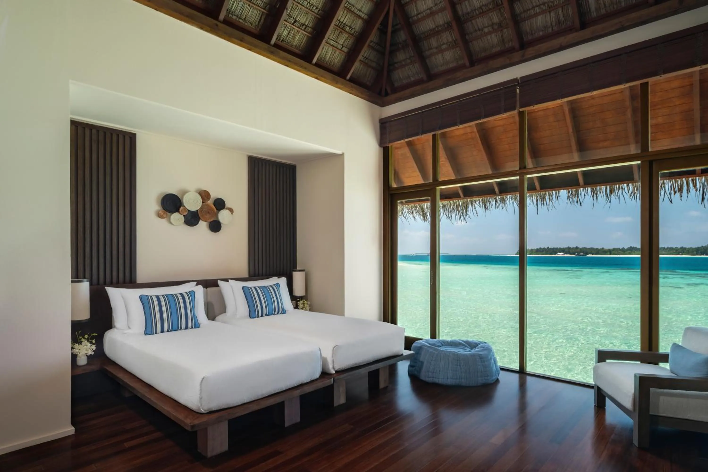 Bed in Conrad Maldives Rangali Island
