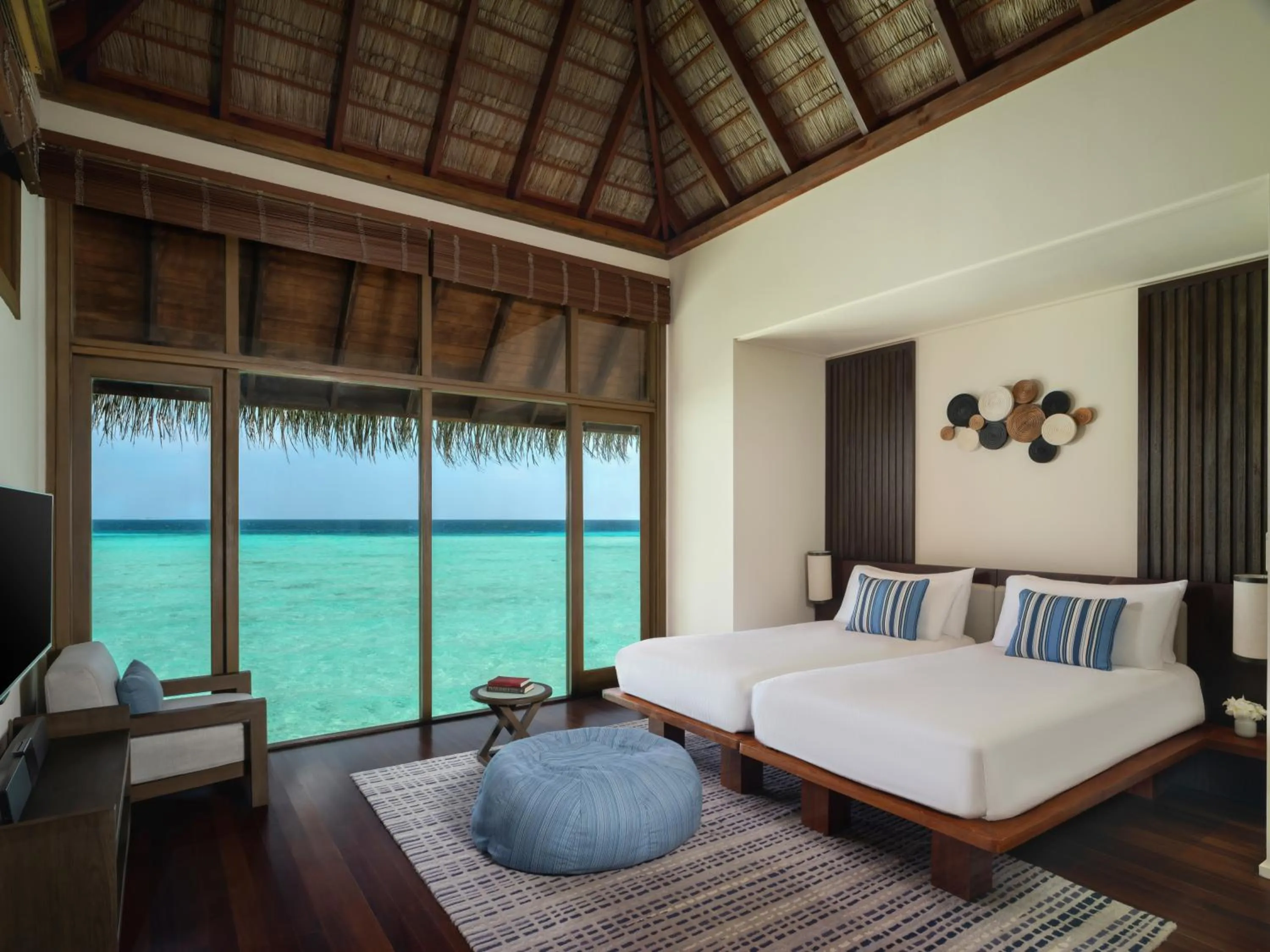 Bed in Conrad Maldives Rangali Island