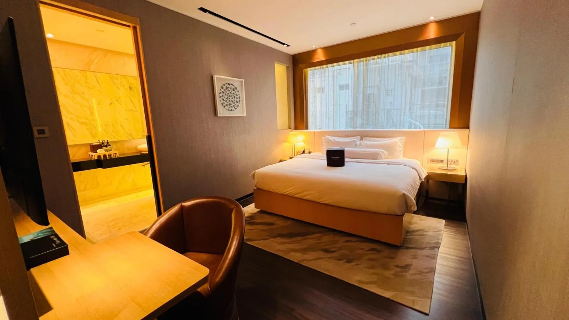 Bed in Naumi Hotel Singapore