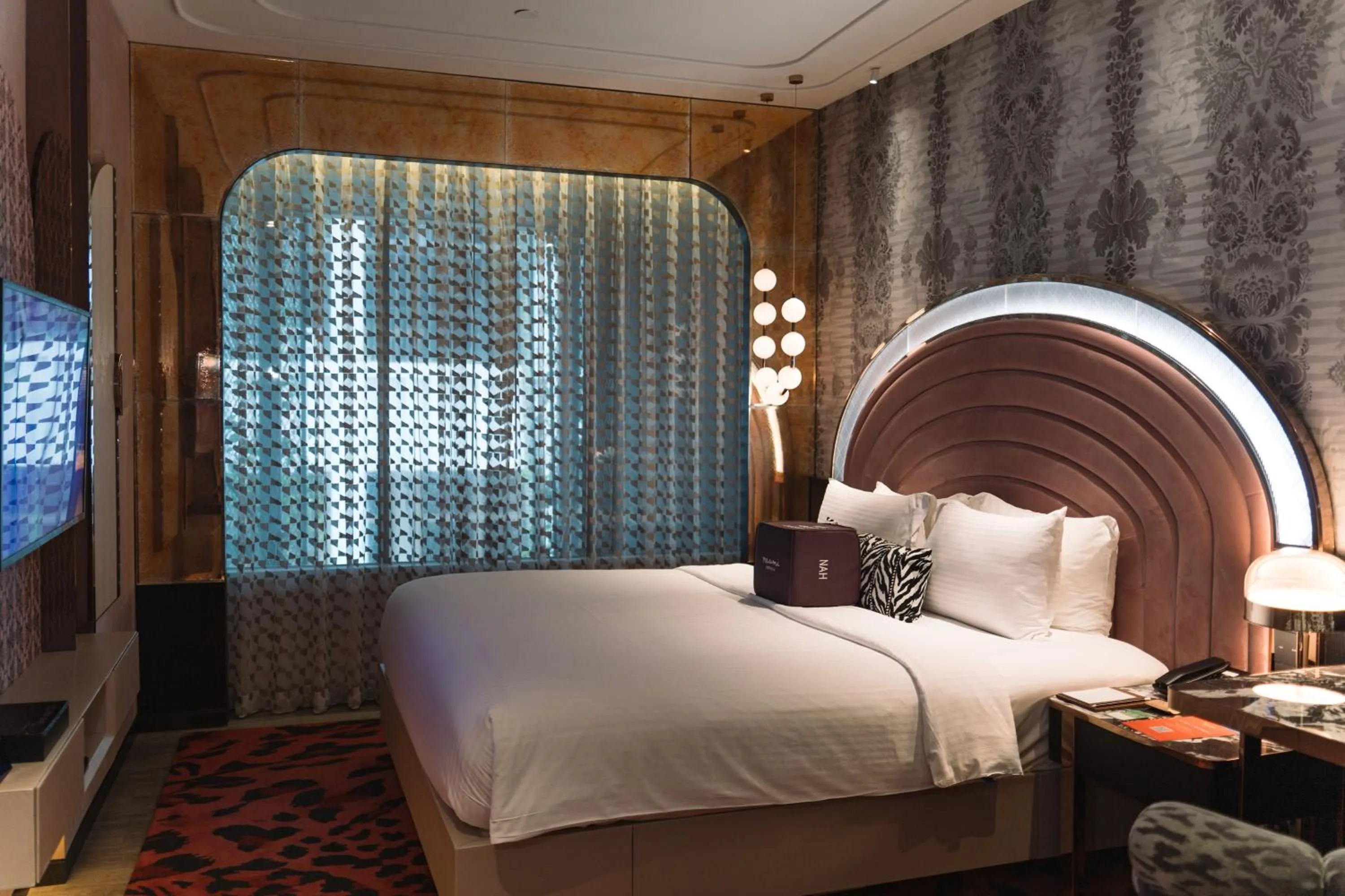 Bed in Naumi Hotel Singapore