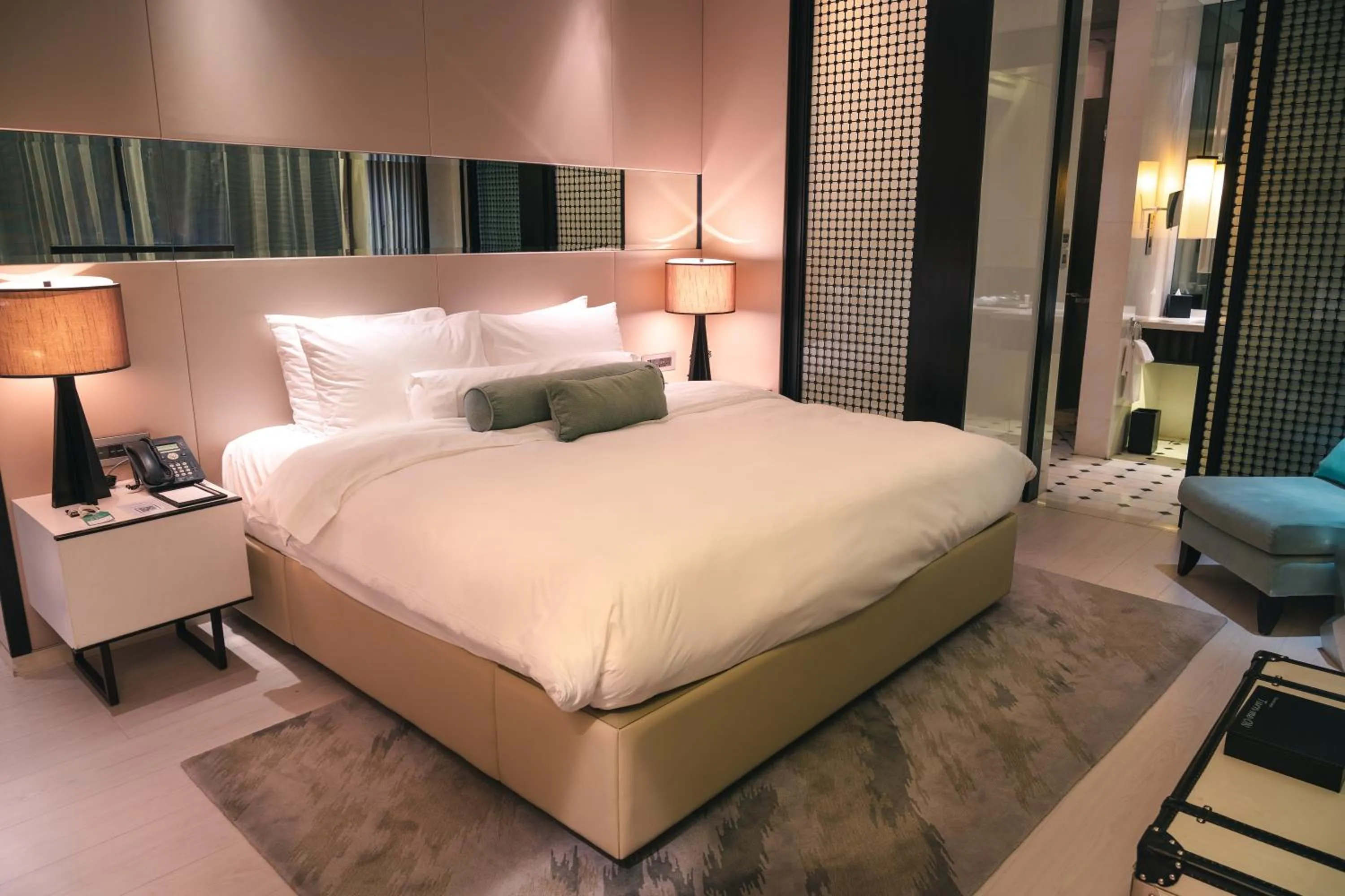 Bed in Naumi Hotel Singapore