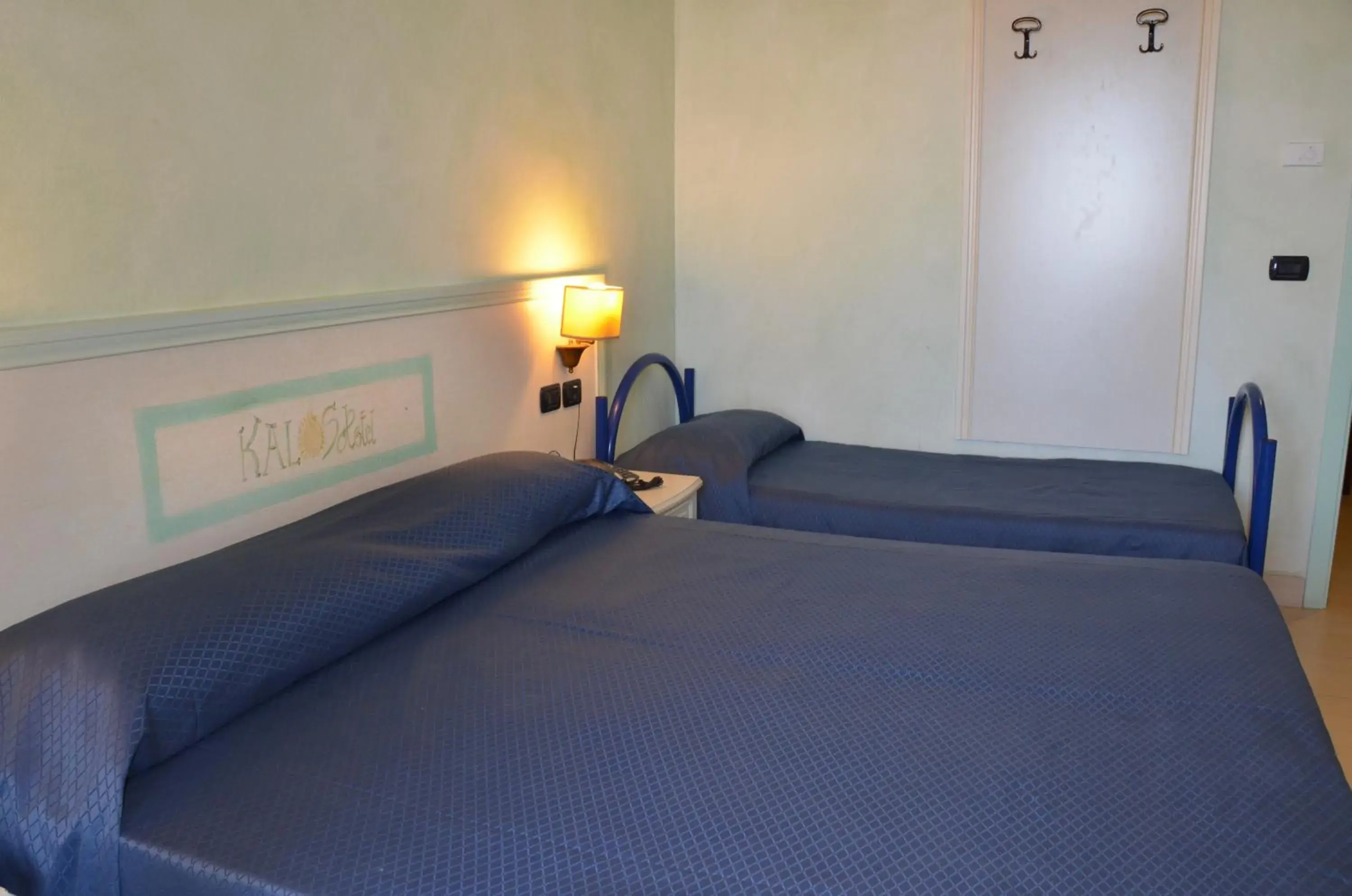 Photo of the whole room, Bed in Kalos Hotel Photo of the whole room, Bed in Kalos Hotel